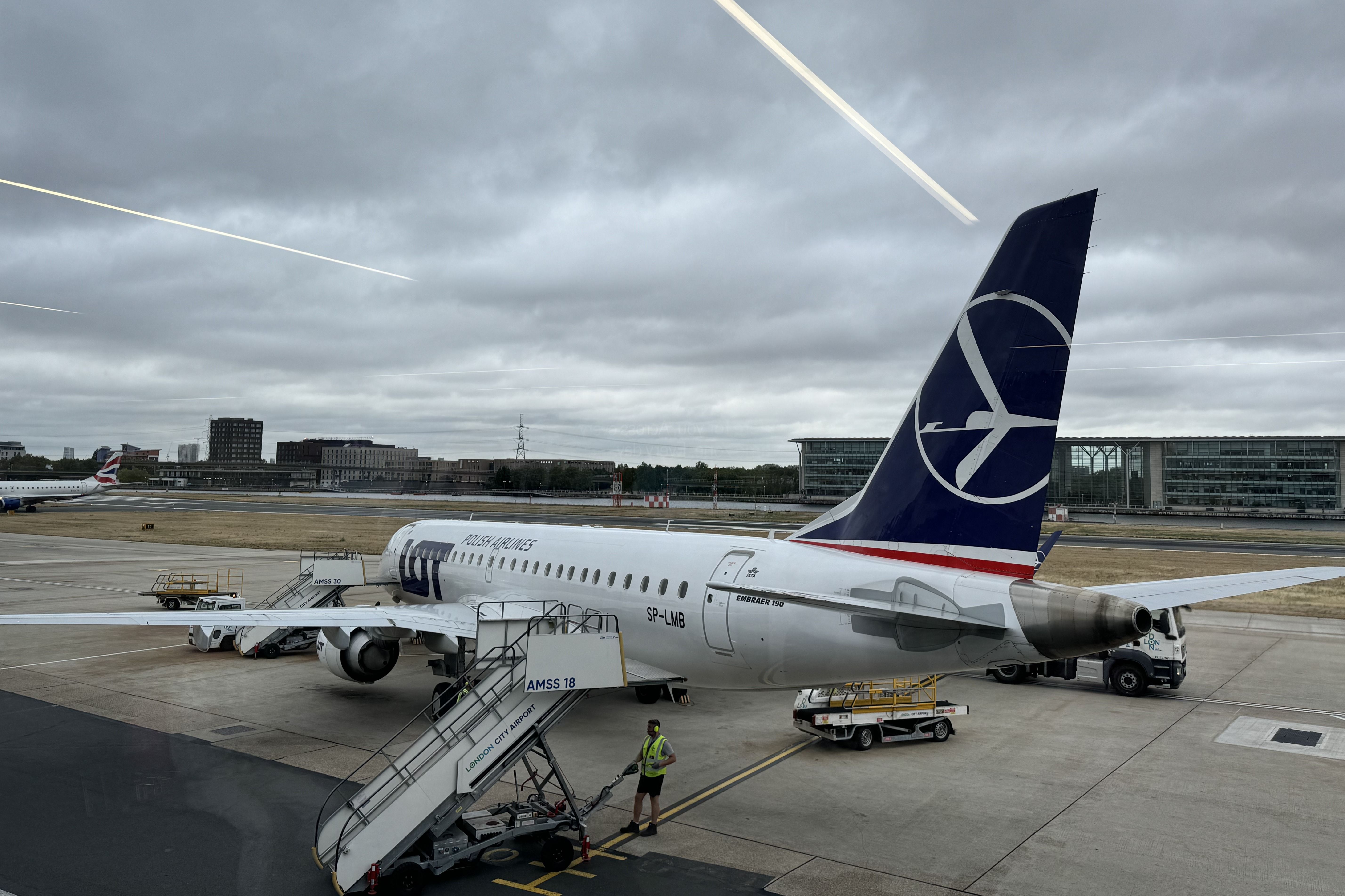 A LOT Polish Airlines Embraer E190 parked at LCY airport