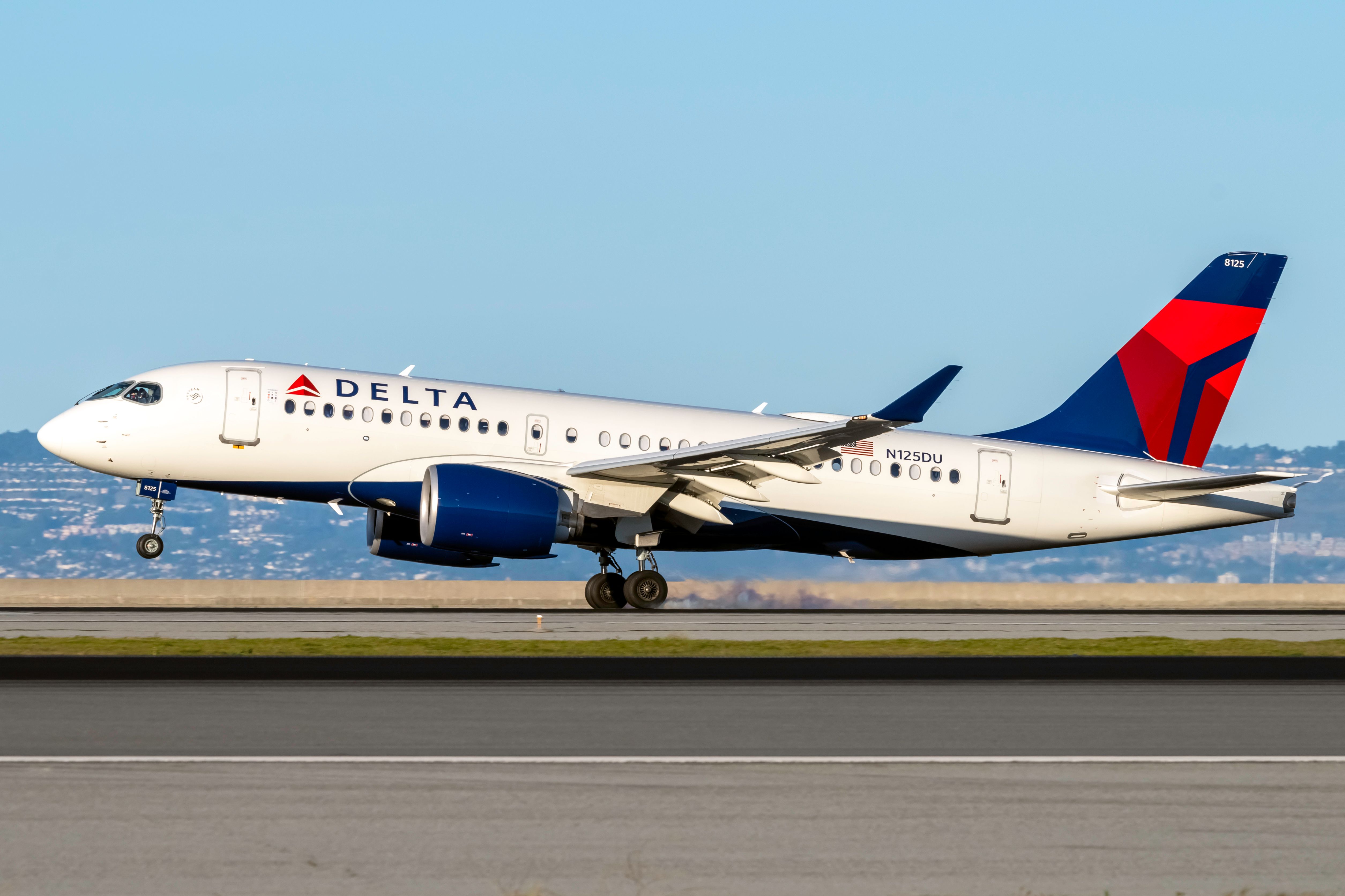 Delta Air Lines Airbus A220-100 (N125DU) landing at San Francisco International Airport.