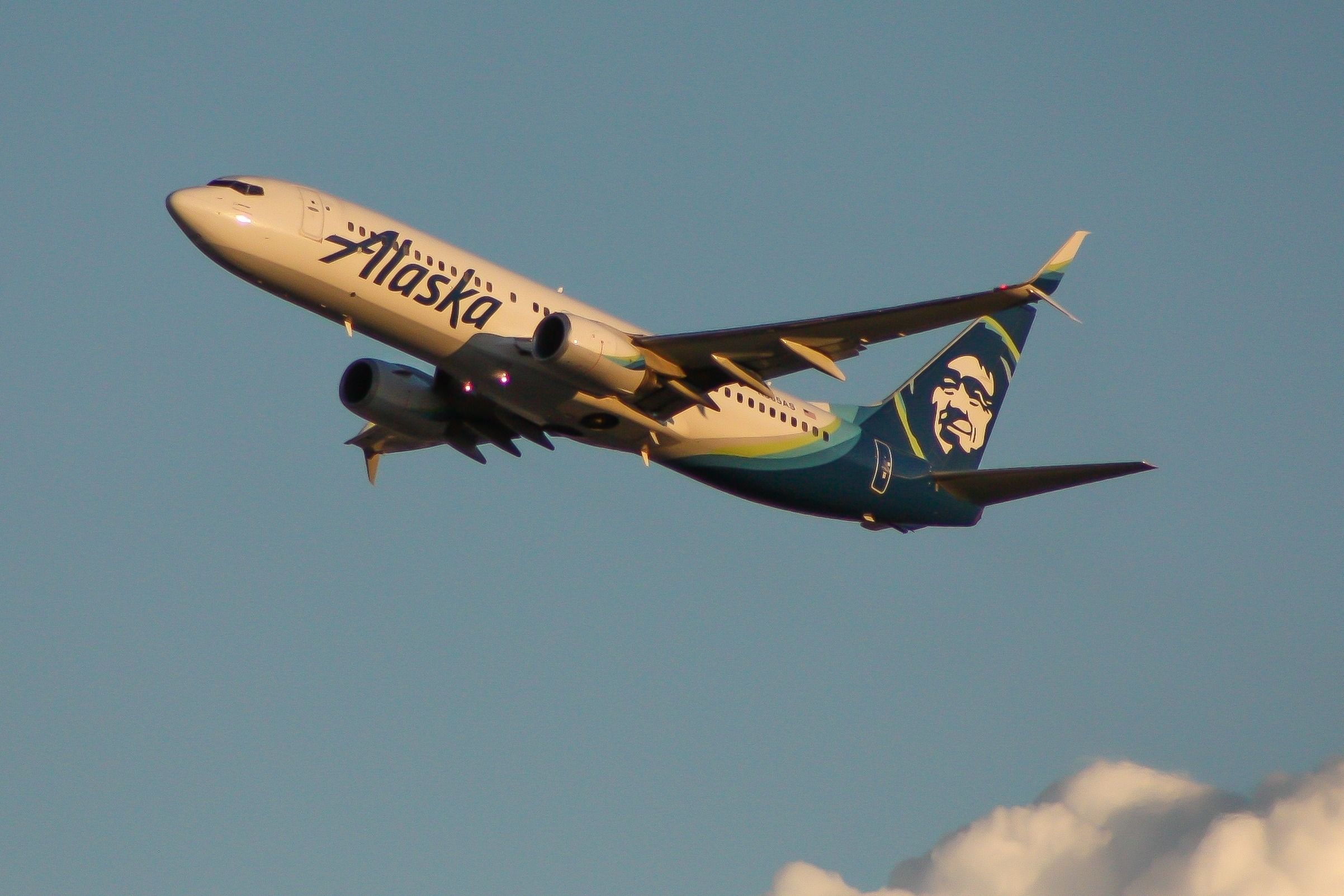 A Boeing 737-800 of Seattle-based Alaska Airlines above the clouds