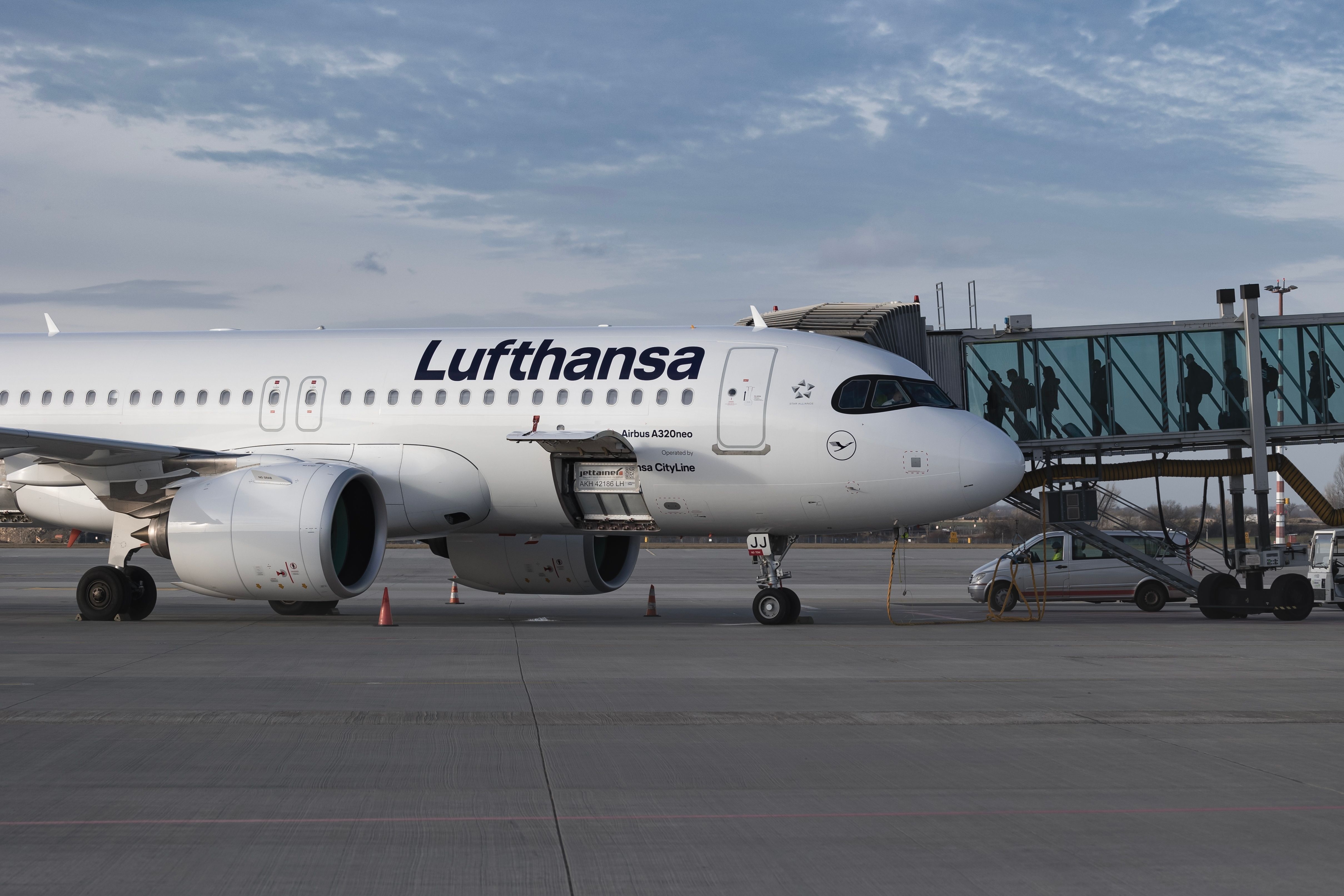 A Lufthansa Airbus A320neo on a parking stand