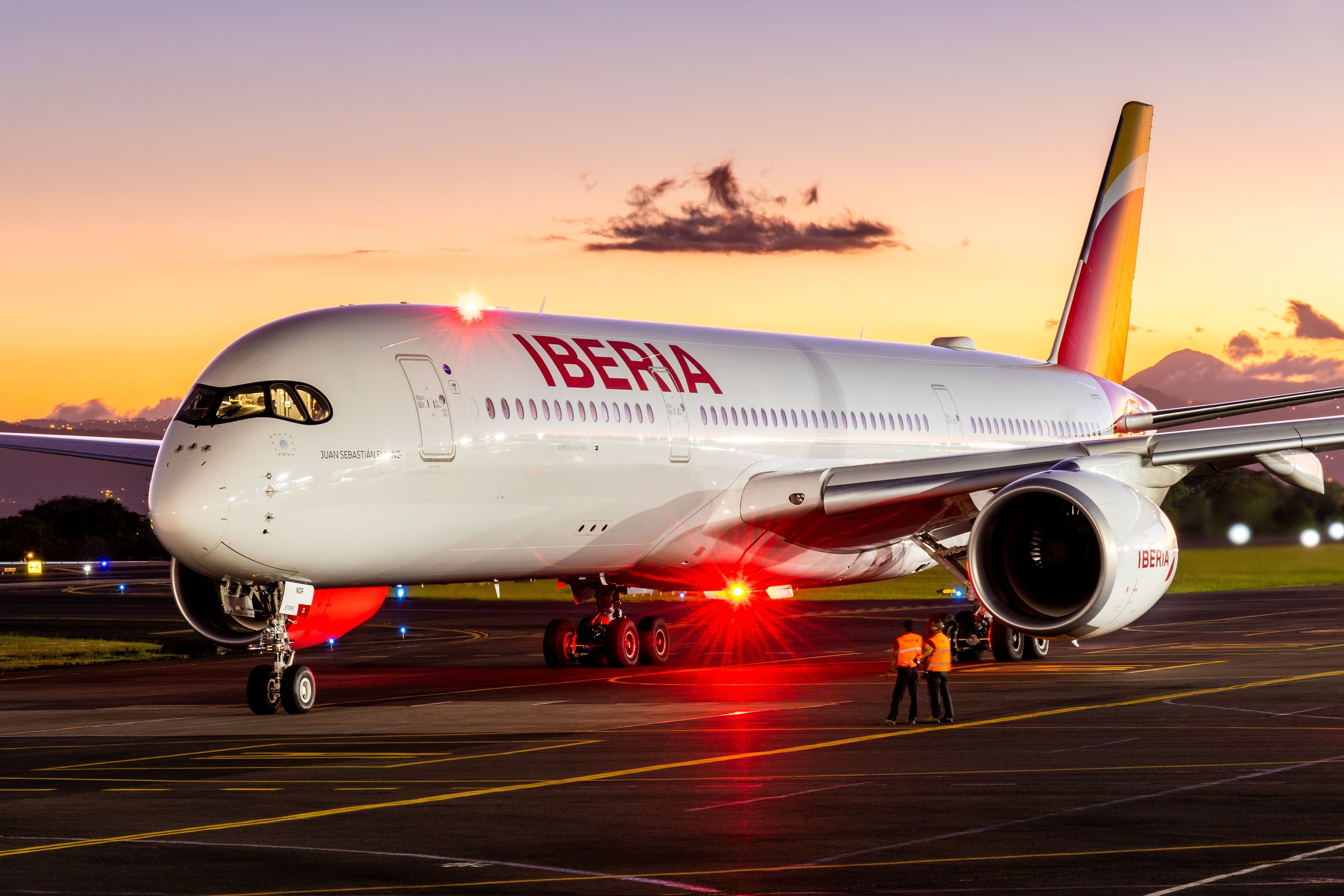 An Iberia Airbus A350 widebody at an airport