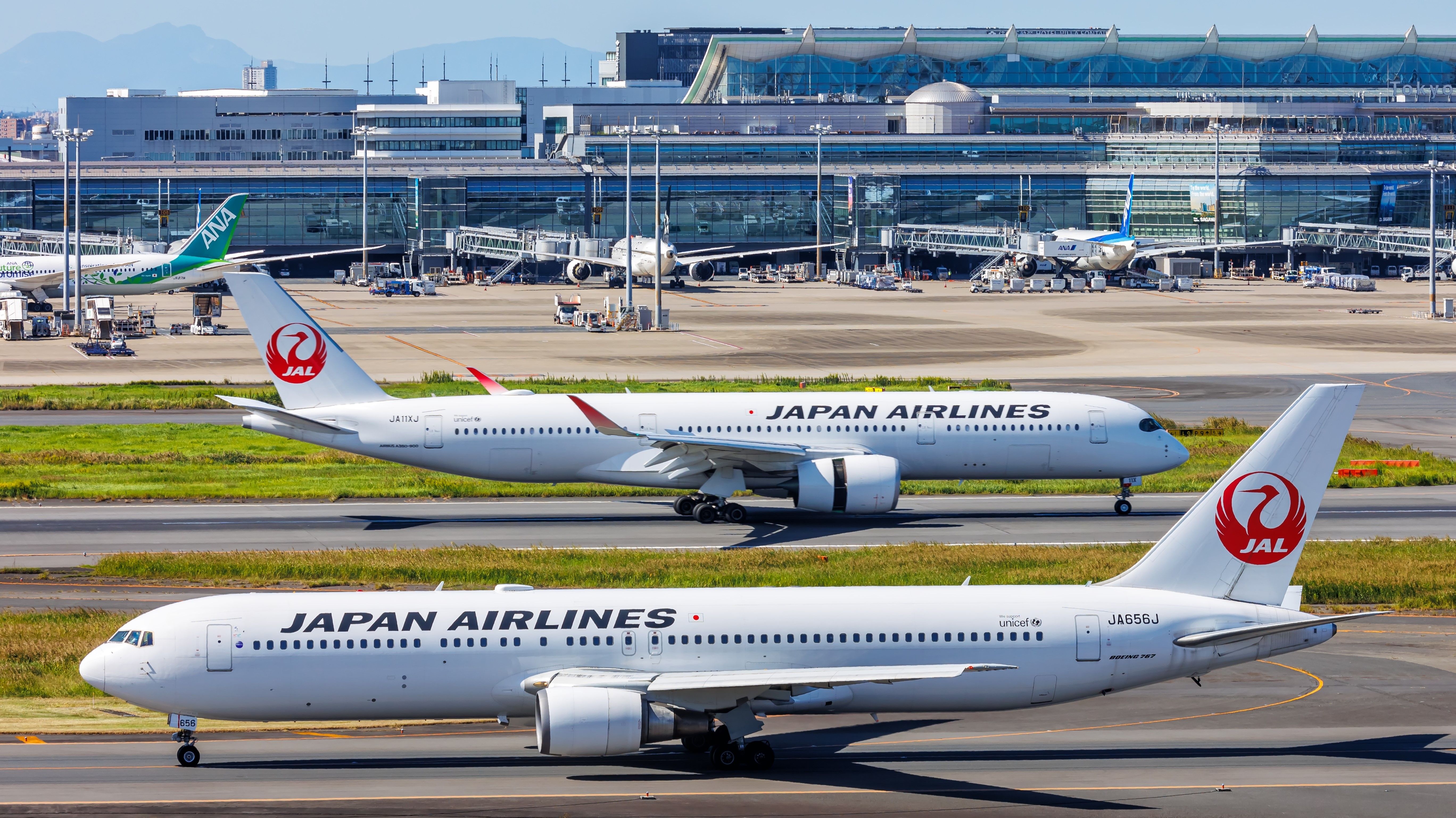 Japan Airlines Airbus A350 & Boeing 767 In Taxiing Tokyo