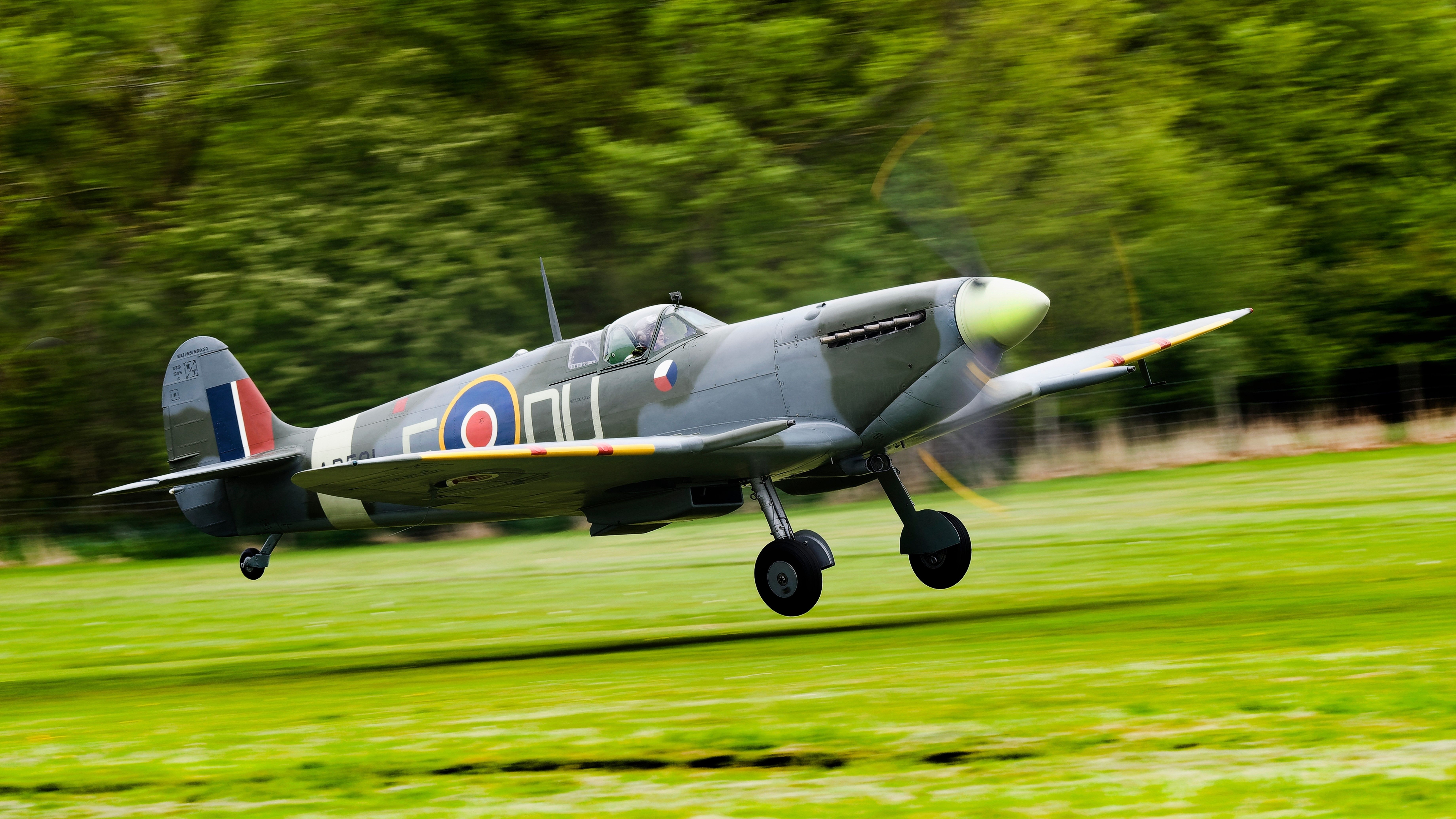 Supermarine Spitfire On Grass Runway