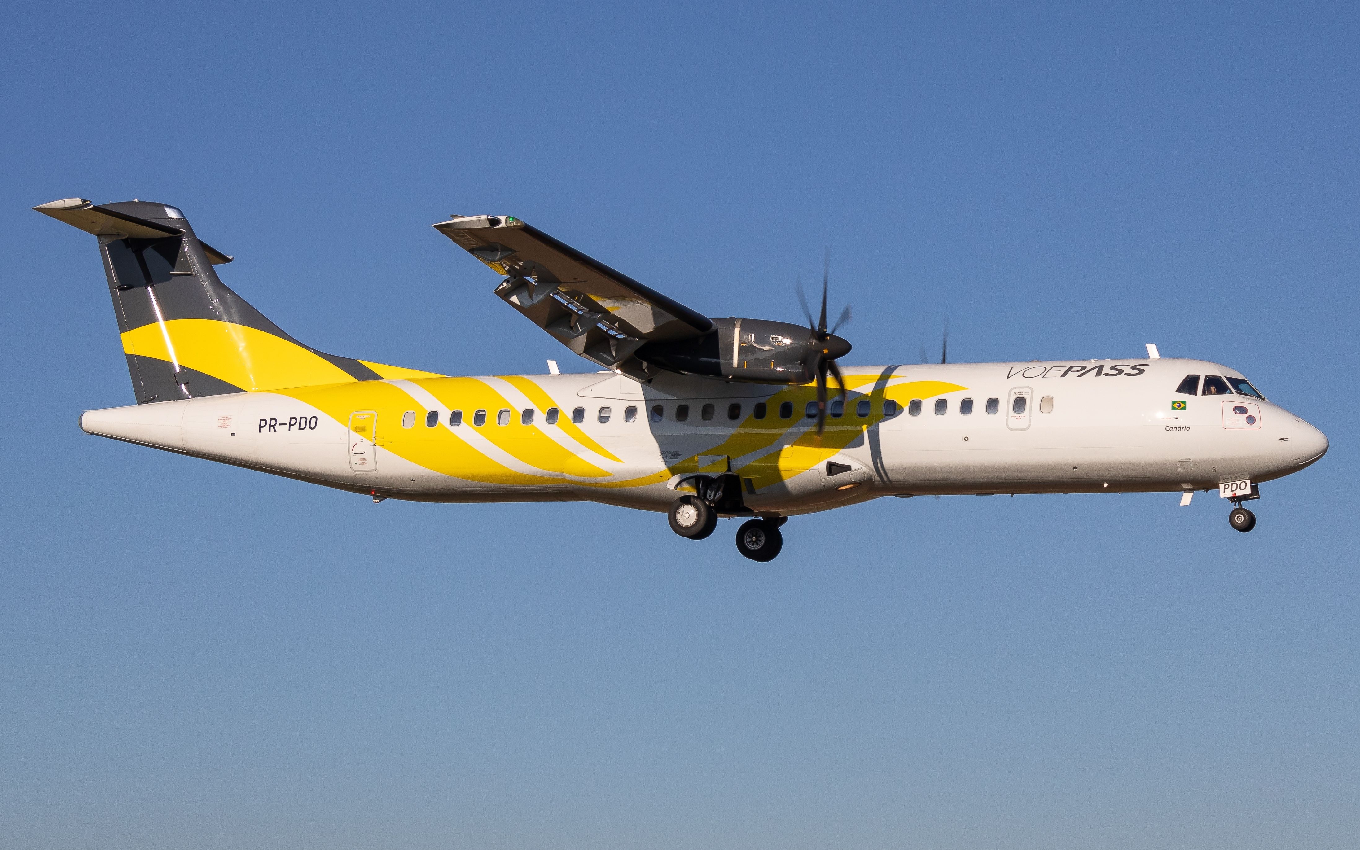 A Voepass ATR 72 on approach to an airport