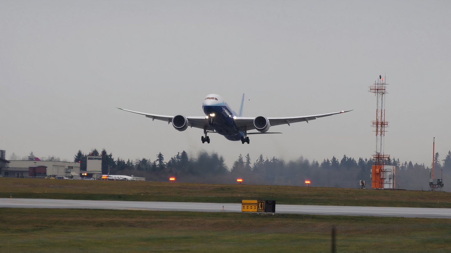 Boeing 787-8 Dreamliner takes off from Everett.