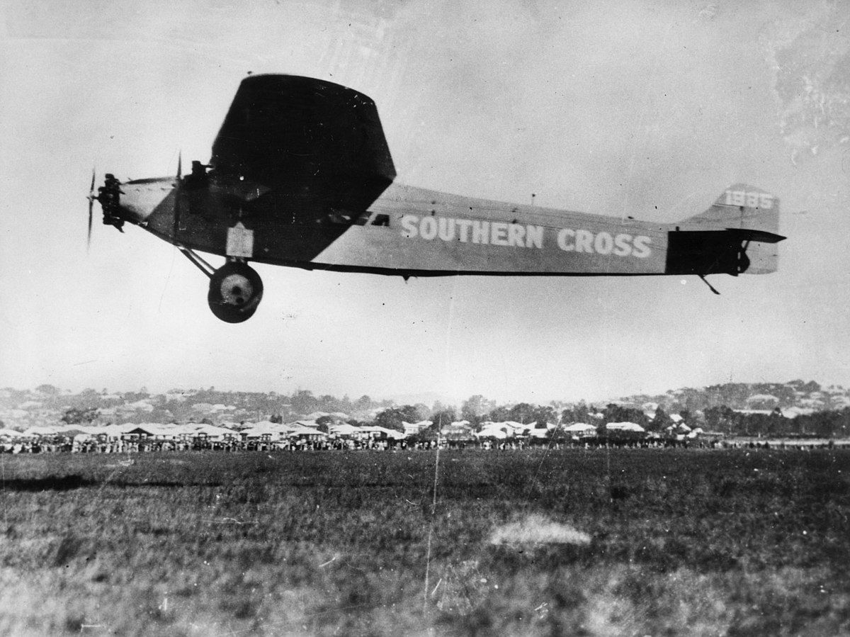 Landing the aircraft, Southern Cross in Brisbane, Queensland, ca. 1928 Inscription on back of photograph reads: ' The big three engine Fokker monoplane.' VH-USU Southern Cross.