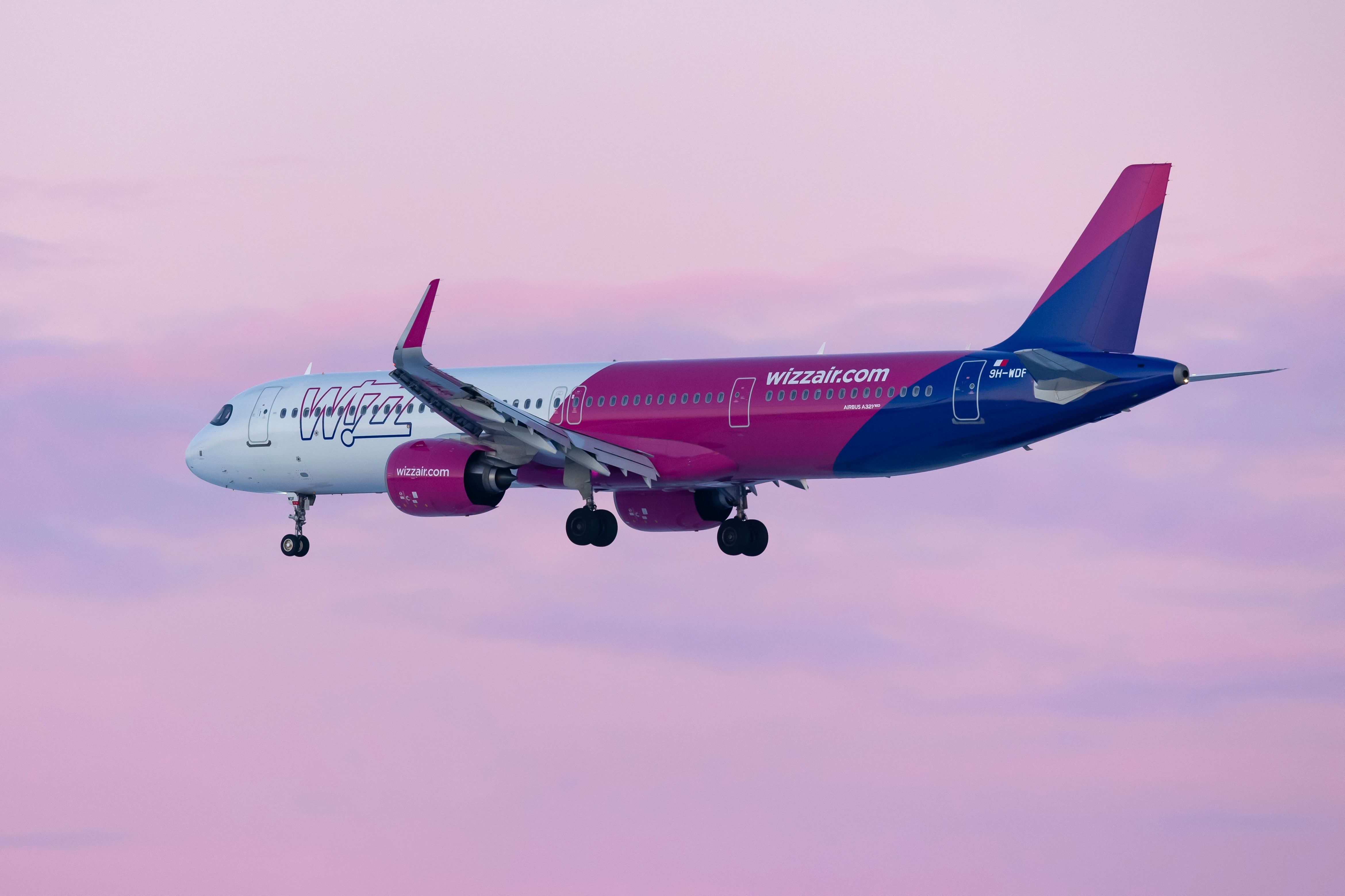 Wizz Air Airbus A321neo landing at PRG shutterstock_2416456323