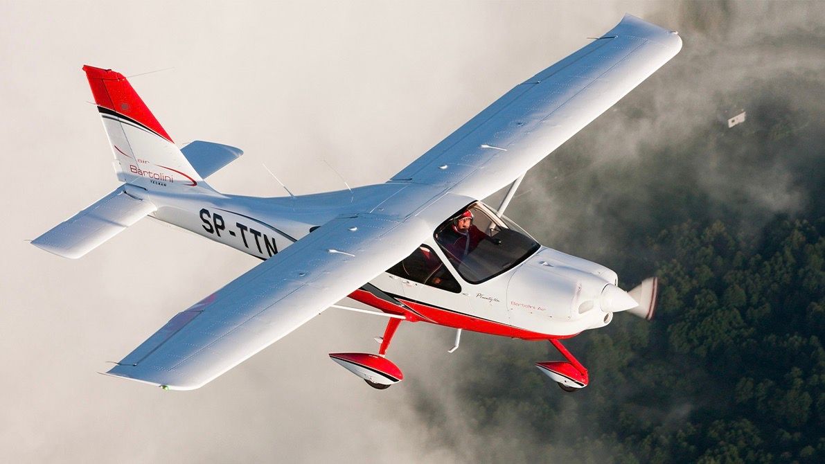 Tecnam P2010 flying in the sky