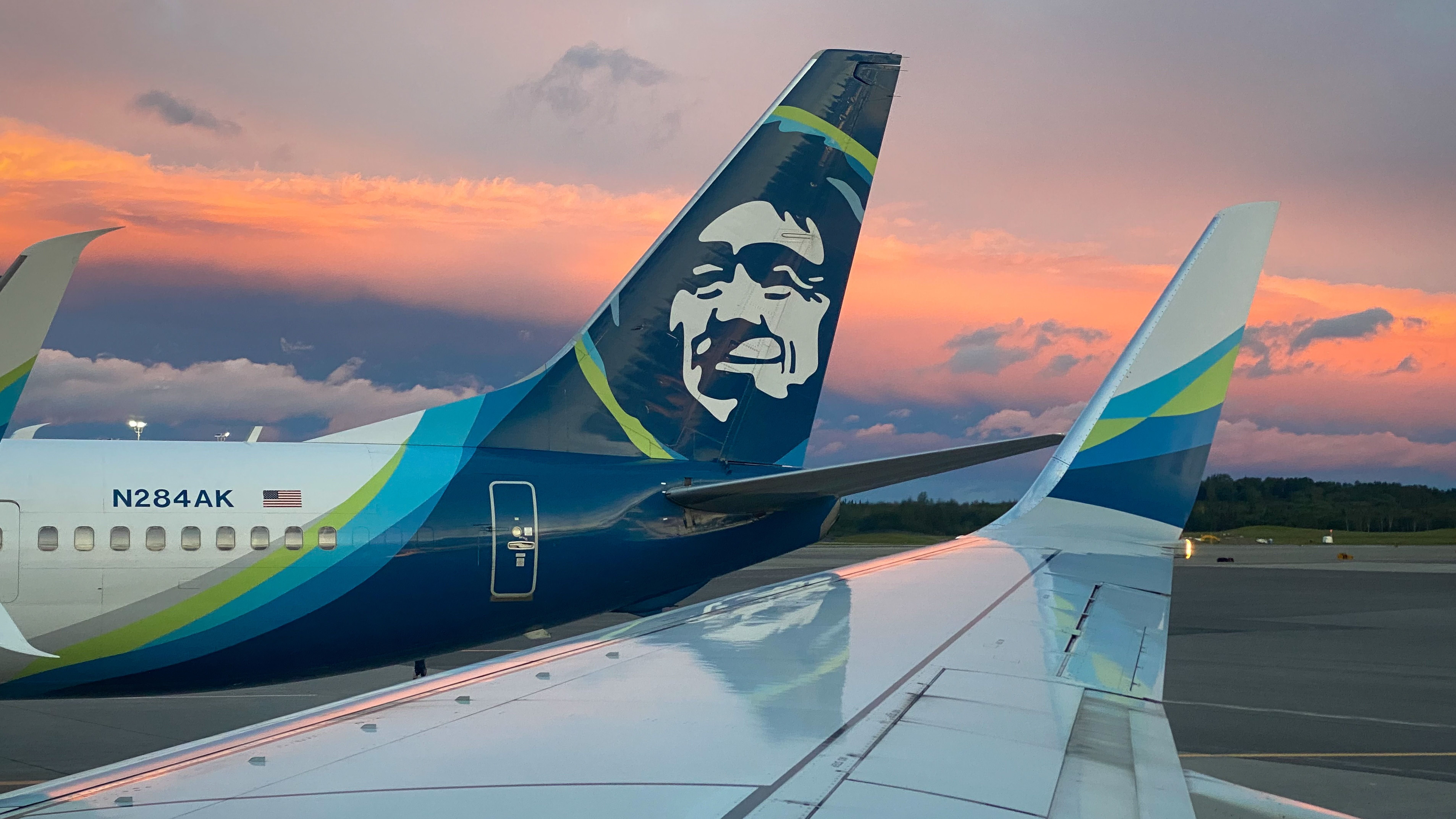 Alaska Airlines Boeing 737s on the ground at ANC shutterstock_2395159057