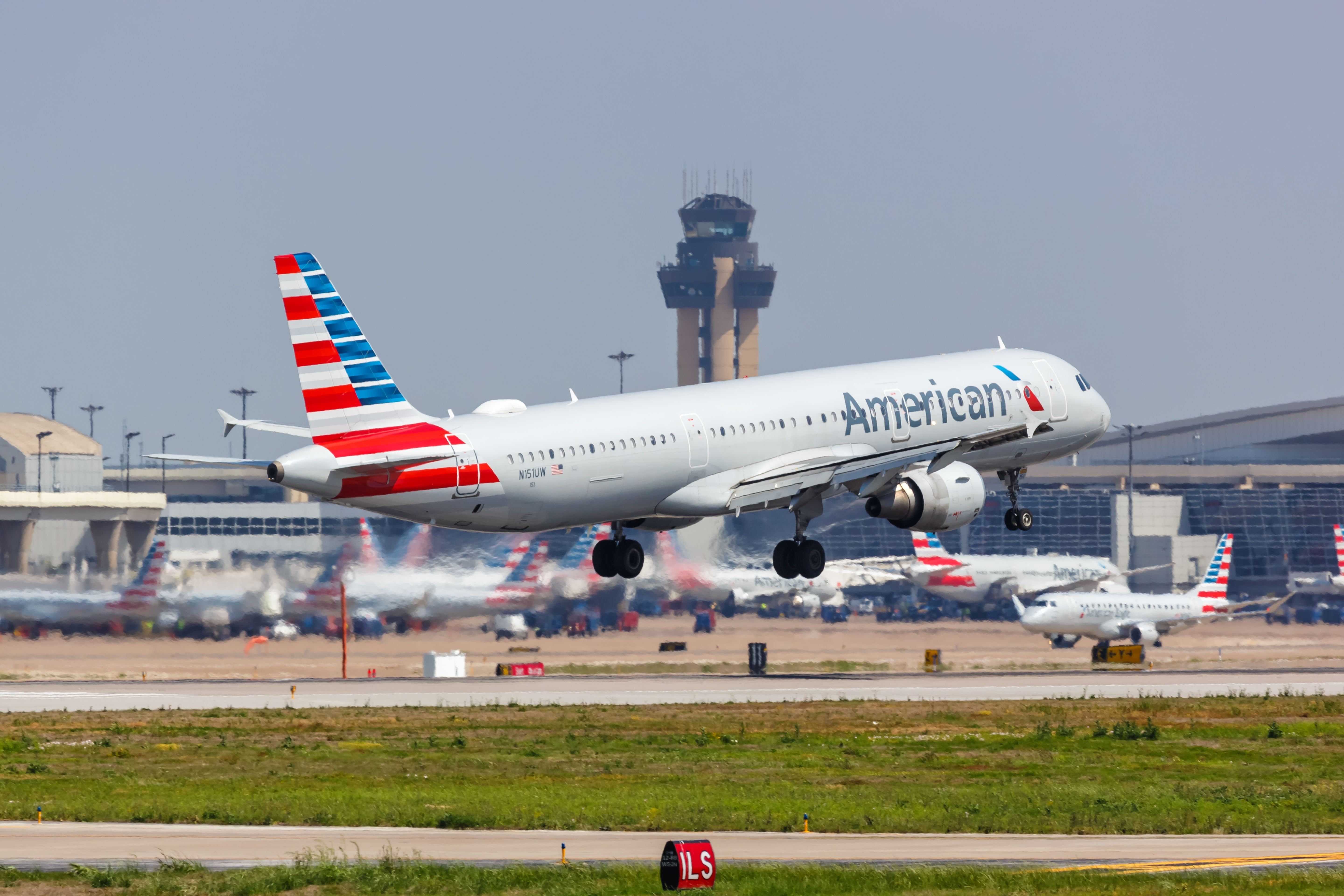 American Airlines Airbus A321ceo departing Dallas Fort Worth International Airport DFW shutterstock_2336681643