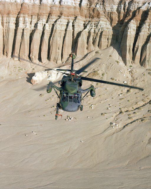 An air to air front view of an HH-60D Night Hawk helicopter