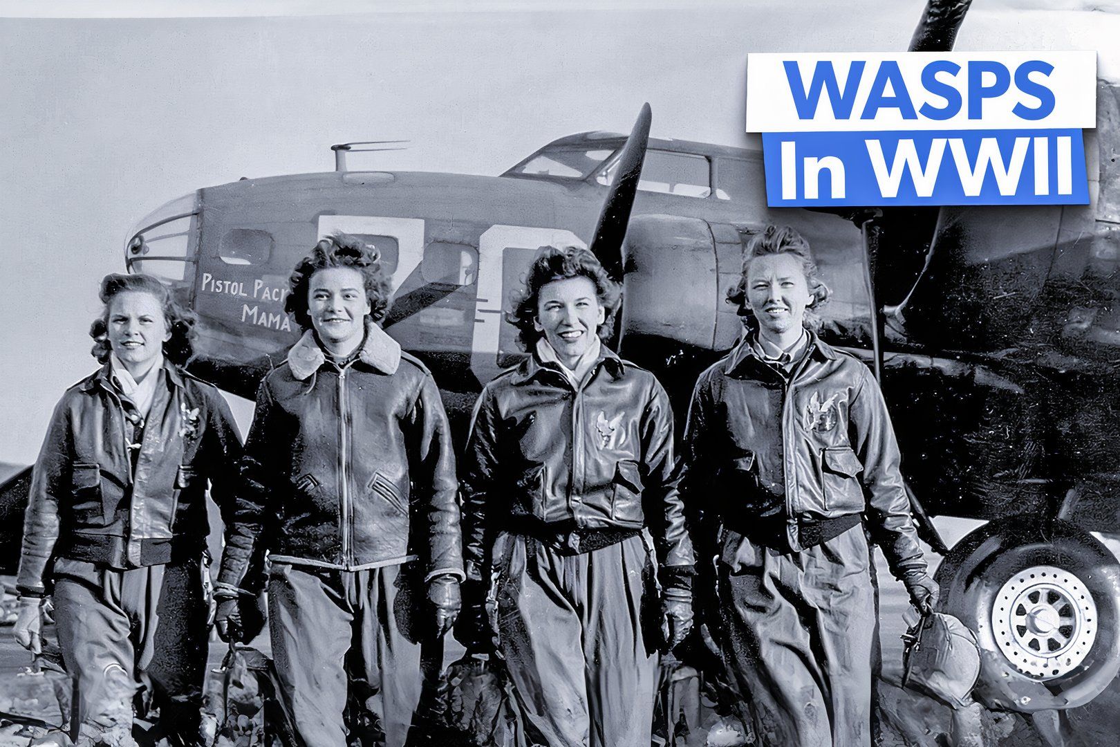 Four WASP pilots walk together with the nose of a B-17 in the background.