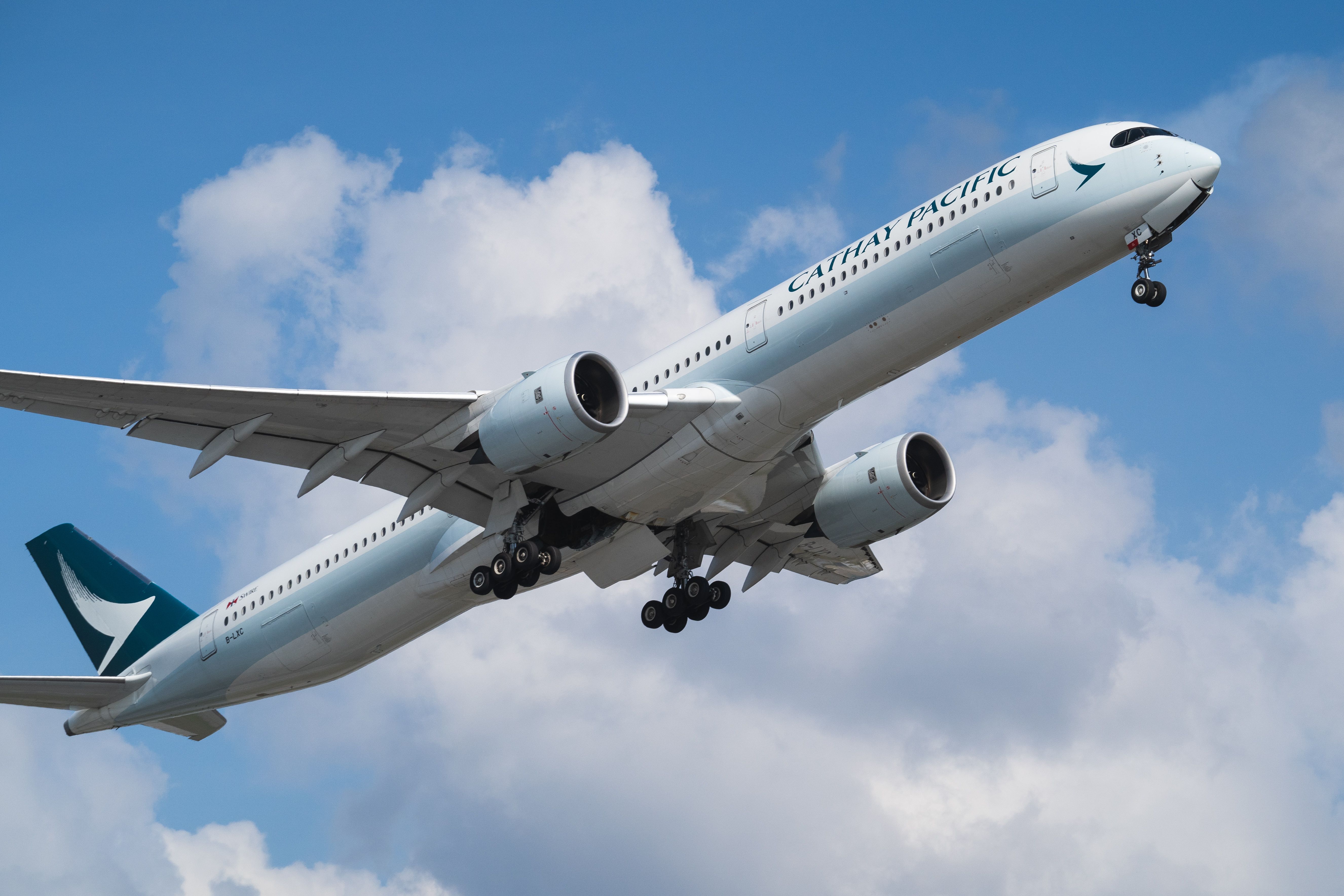 Cathay Pacific Airbus A350-1000 departing HKG shutterstock_1968366916