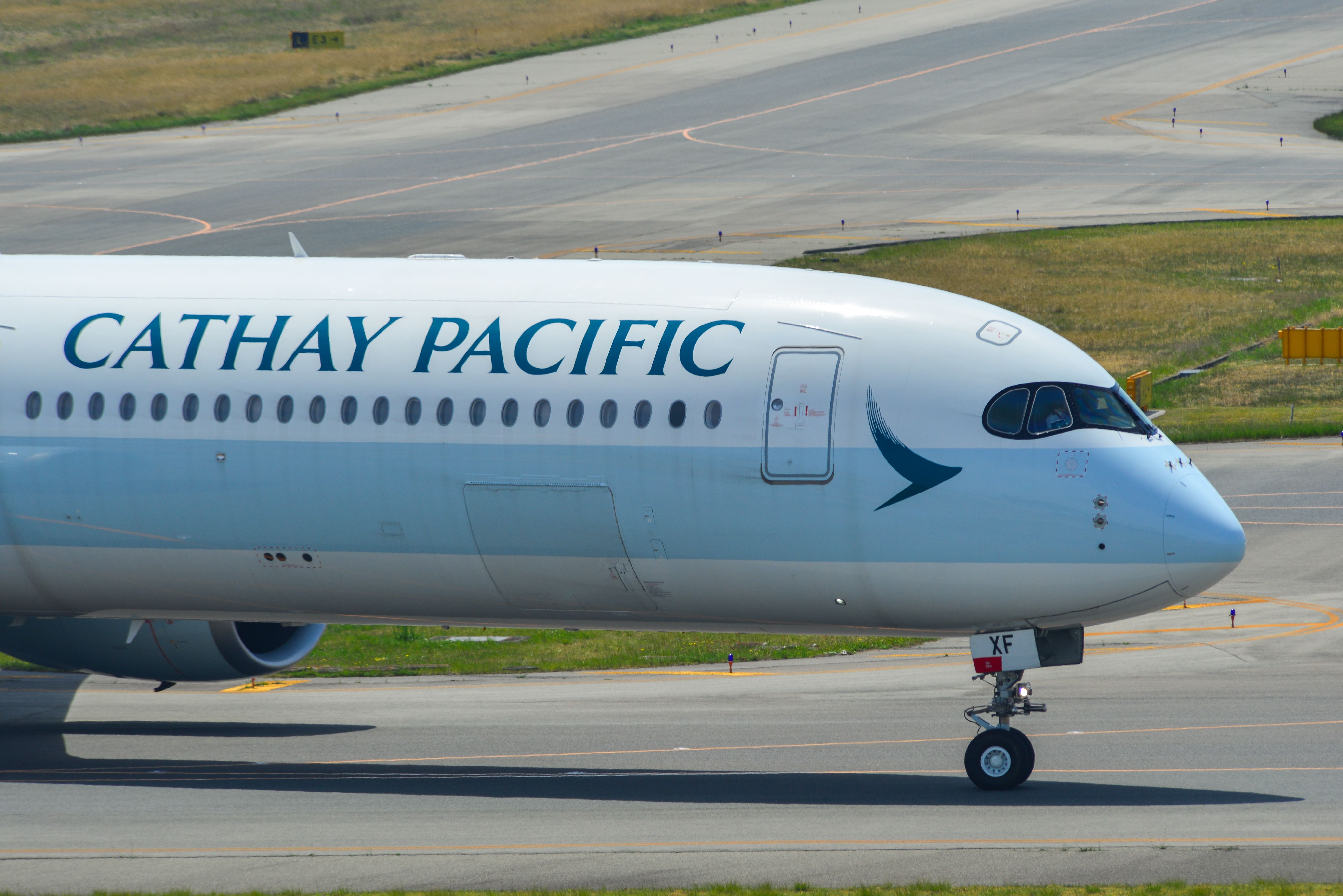 Cathay Pacific Airbus A350-1000 taxiing at KIX shutterstock_1422528719