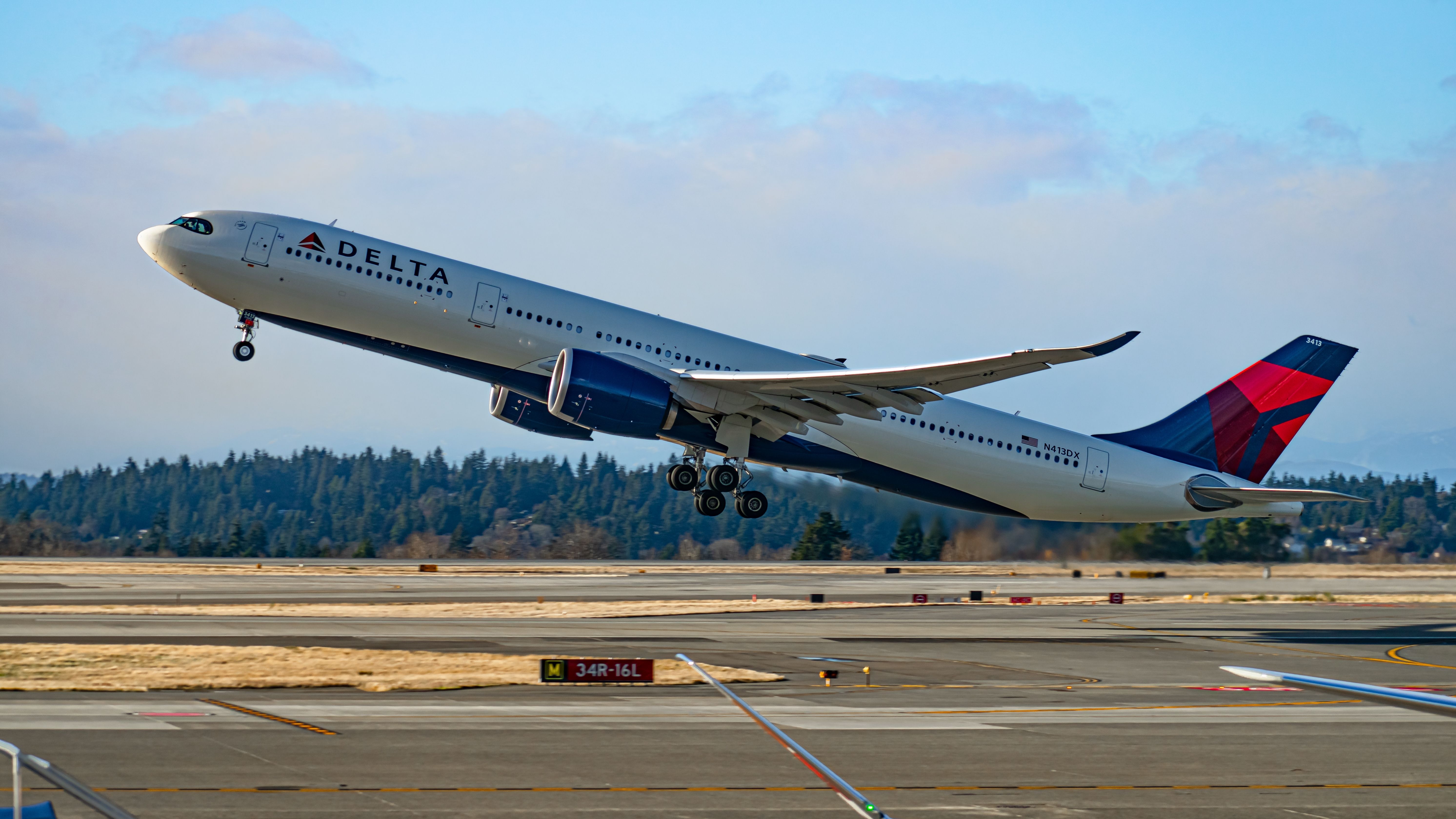 Delta Air Lines Airbus A330-900 deparing SEA shutterstock_2454981235