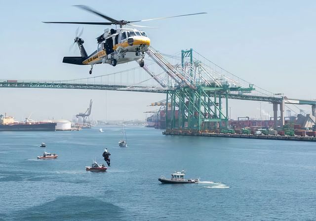 A Los Angeles County Sikorsky S-70 Firehawk helicopter conducts an aerial demonstration