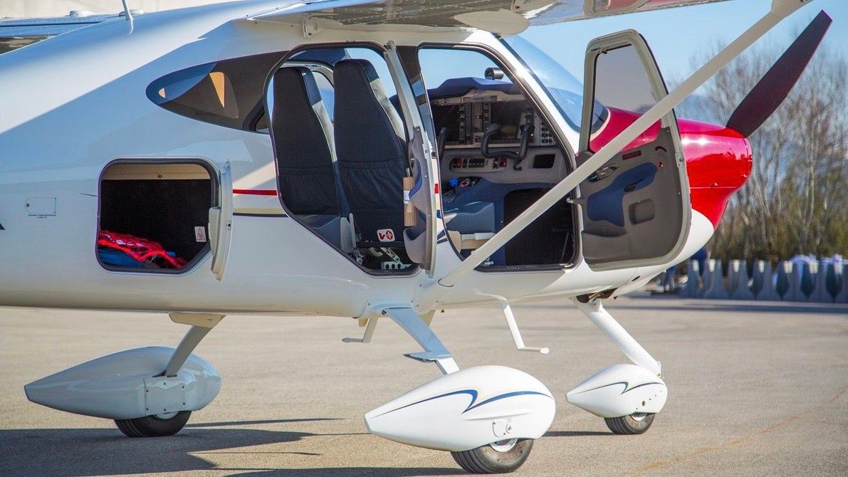 Tecnam P2010 on the ground and interior and exterior