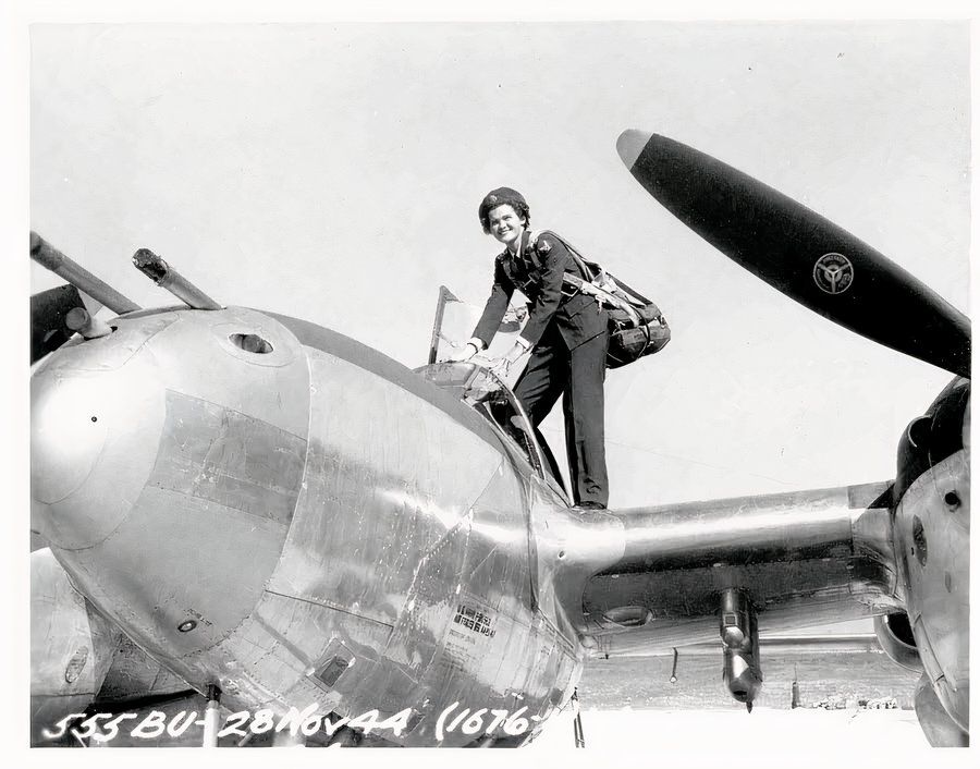 Wasp pilot about to ender the cockpit of a P-38.