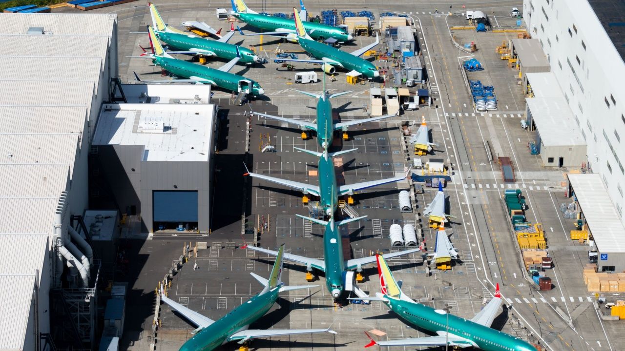 Multiple Boeing 737 MAX and NG parked outside the company factory at Renton Airport.