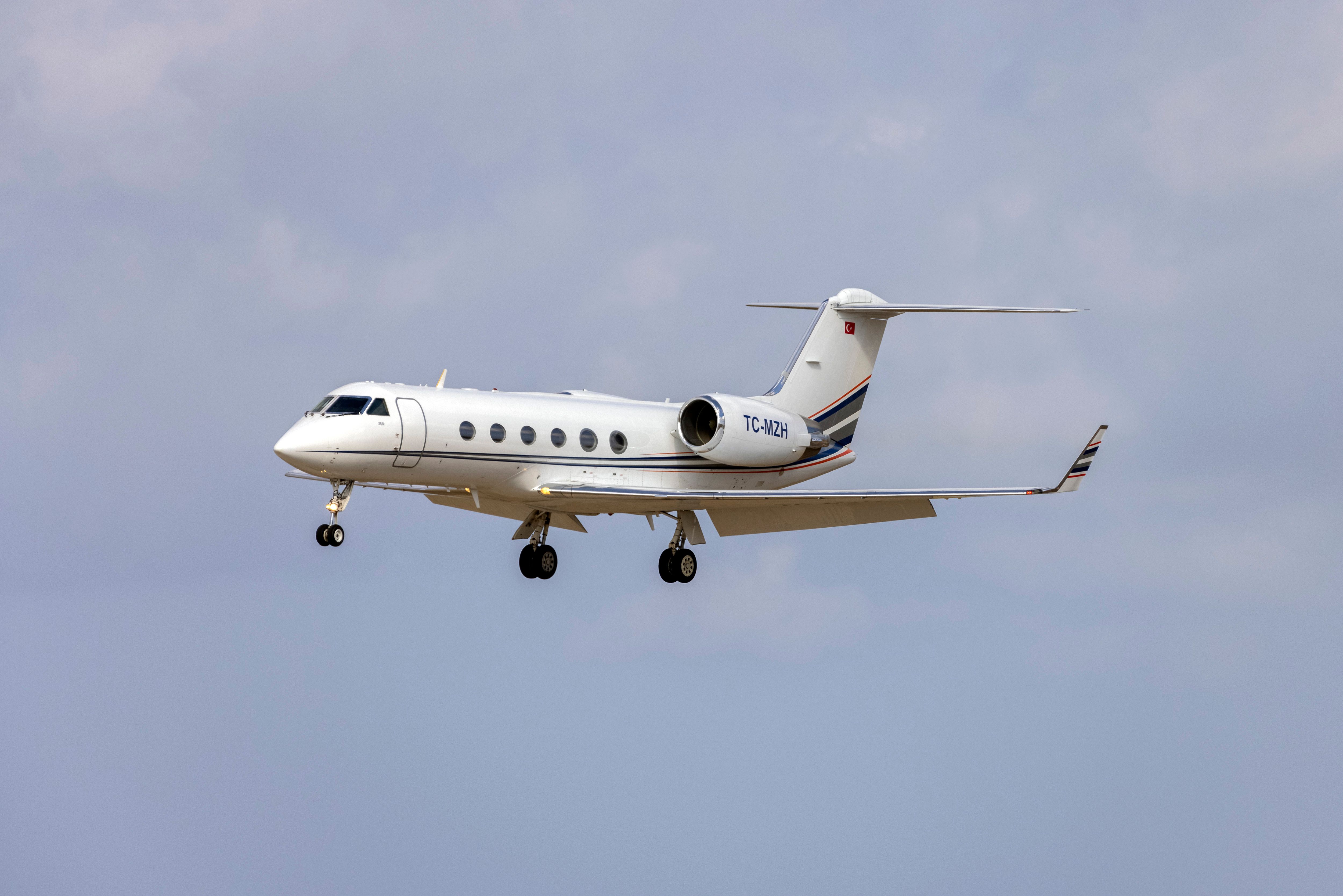 Turkish Registered Gulfstream IV-SP (Reg: TC-MZH) on short finals in strong headwind.