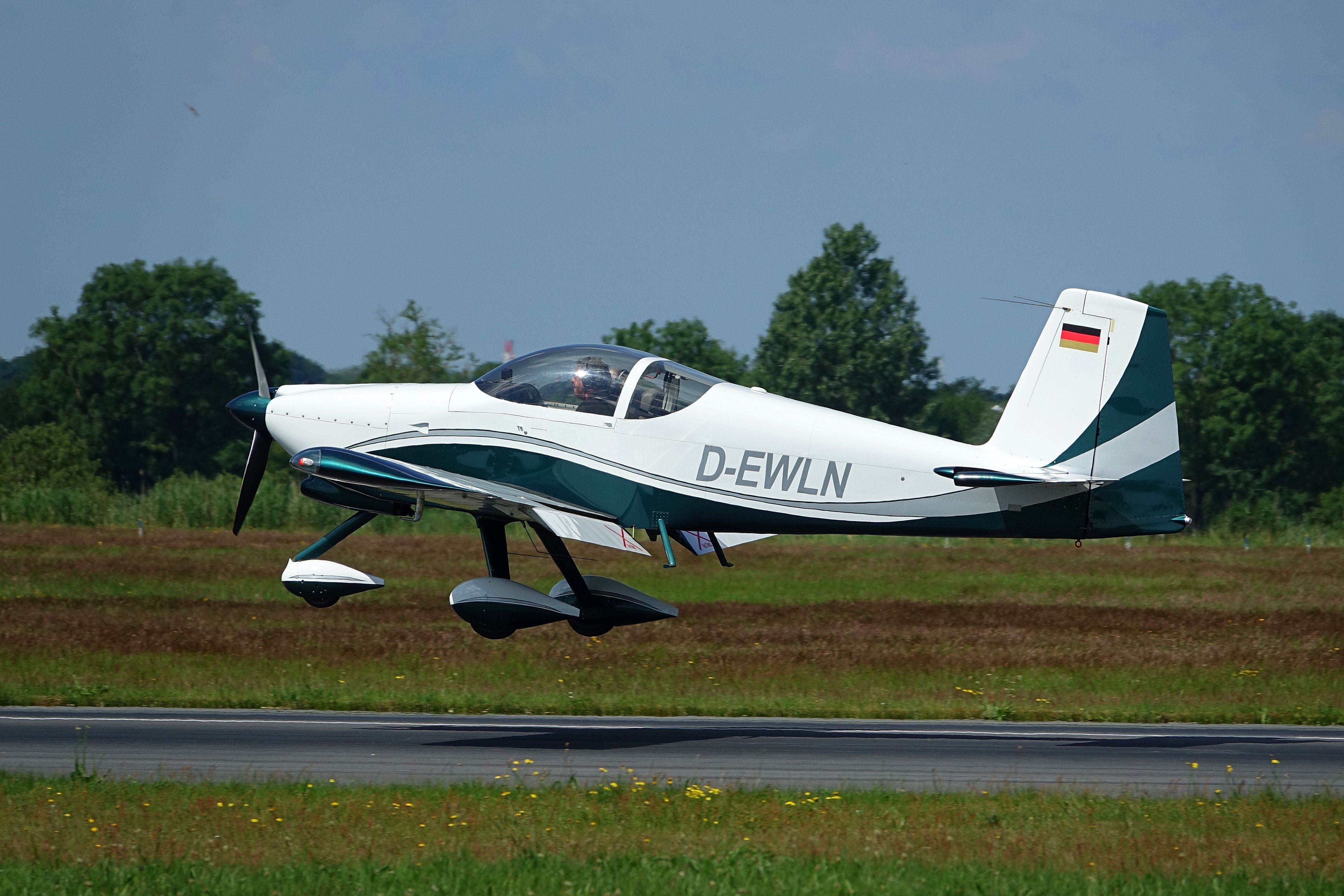 A beautiful in-flight shot of a landing RV-9 aerobatic plane