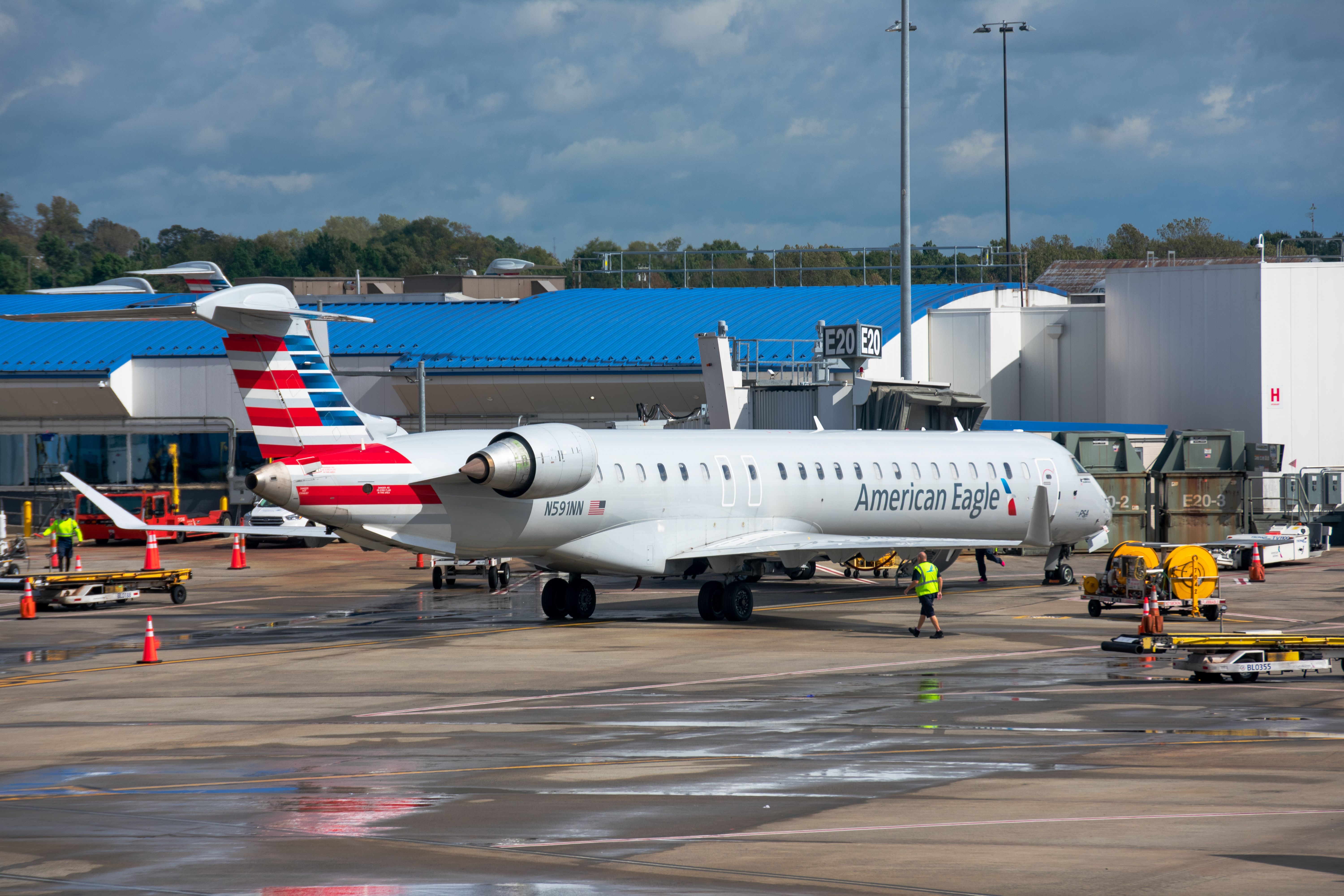 American Eagle (PSA Airlines) Bombardier CRJ900 N591NN at the gate at Charlotte Douglas International Airport.