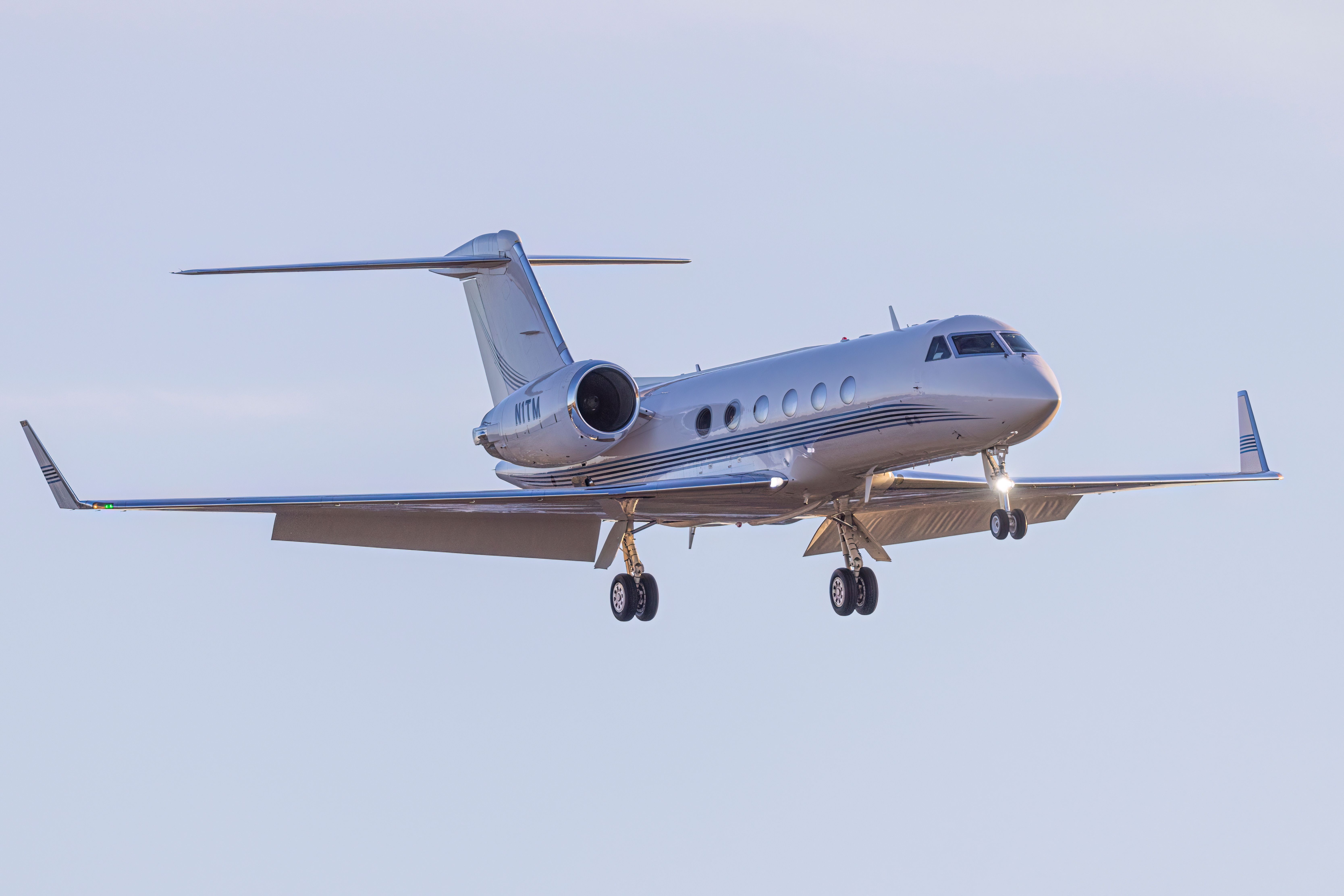 A Gulfstream G-IV arrives at the Centennial Airport at sunset.