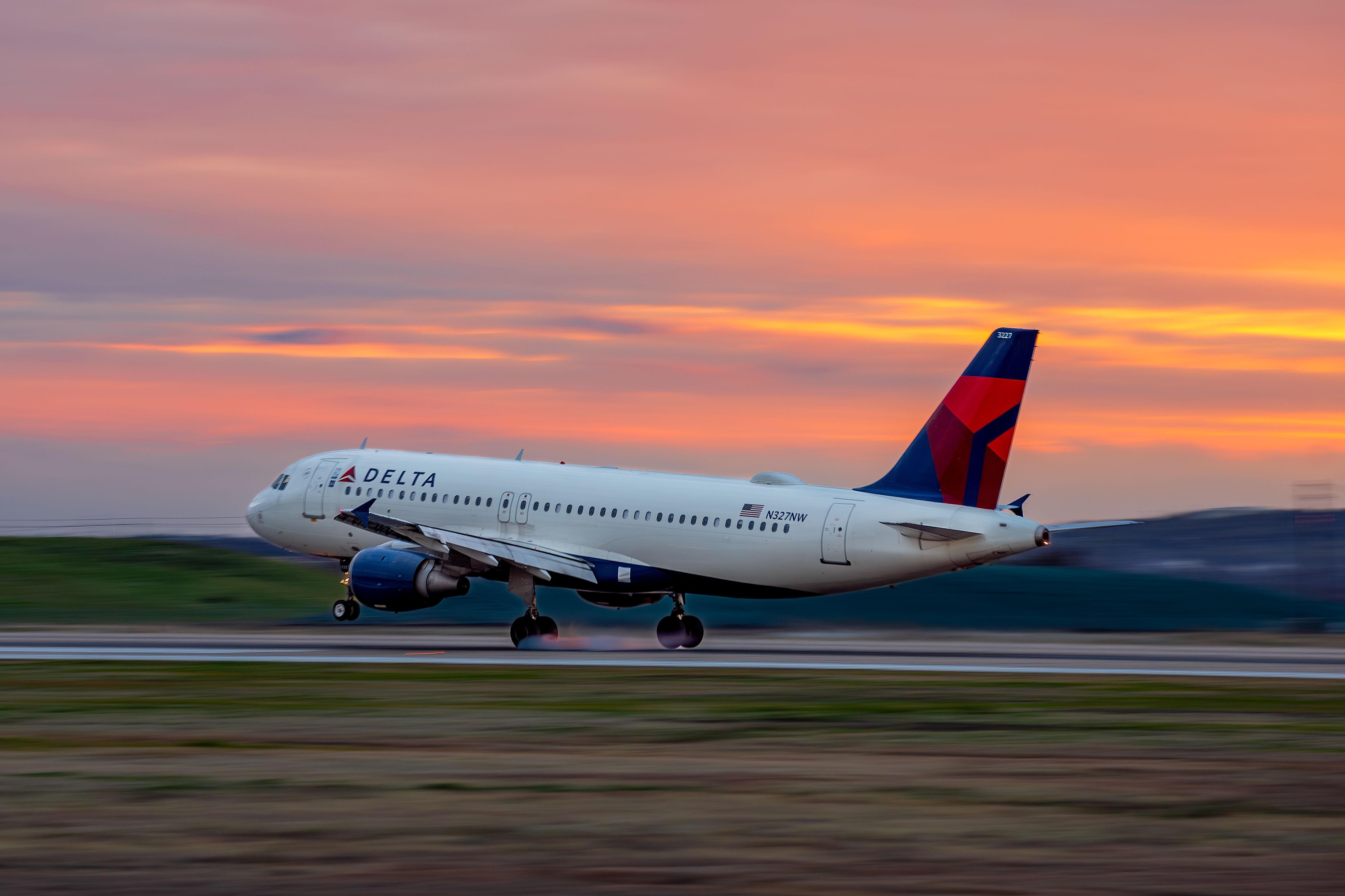 Delta Air Lines Airbus A320 (N327NW) landing at Austin-Bergstrom International Airport.