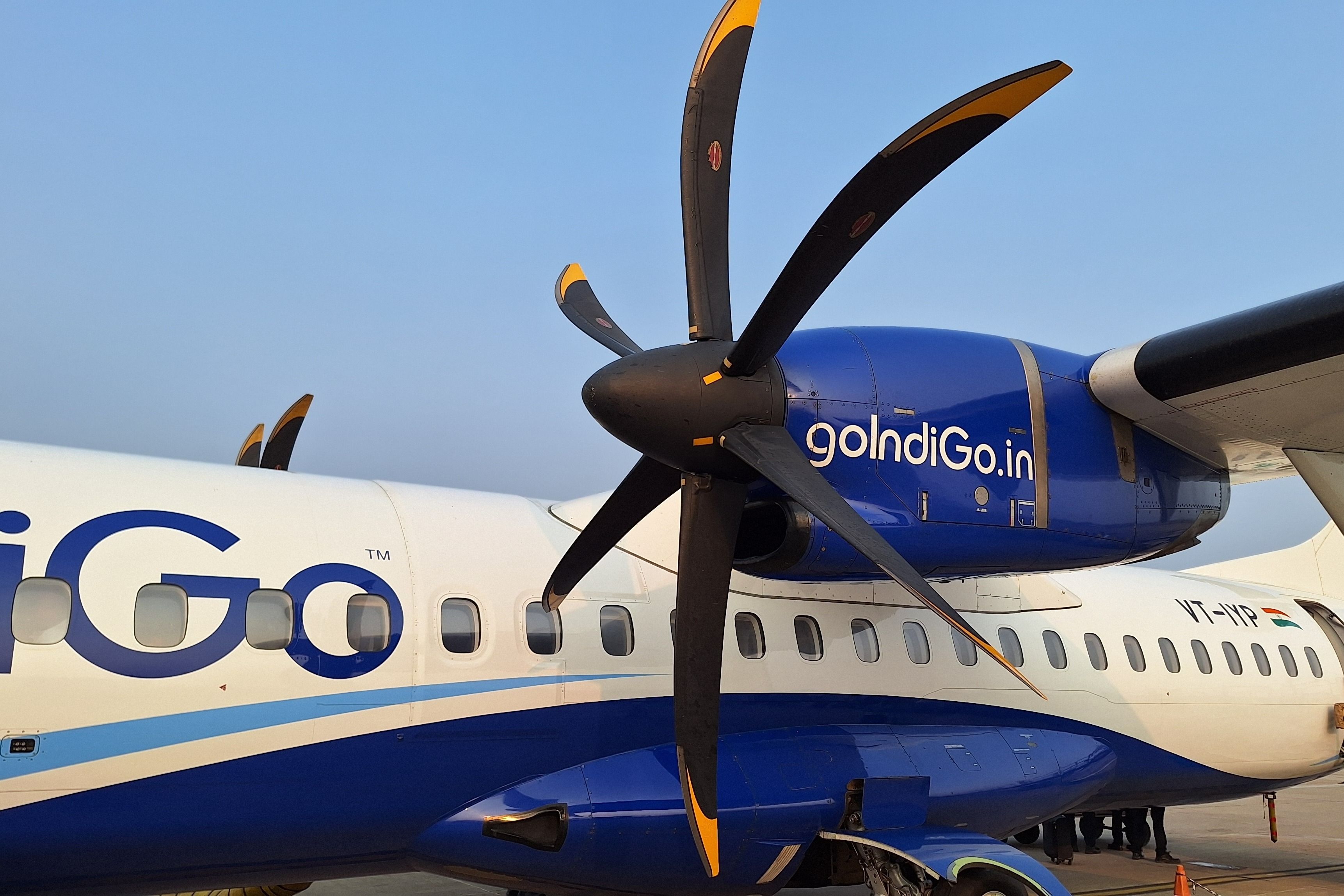 An IndiGo ATR 72 parked at an airport