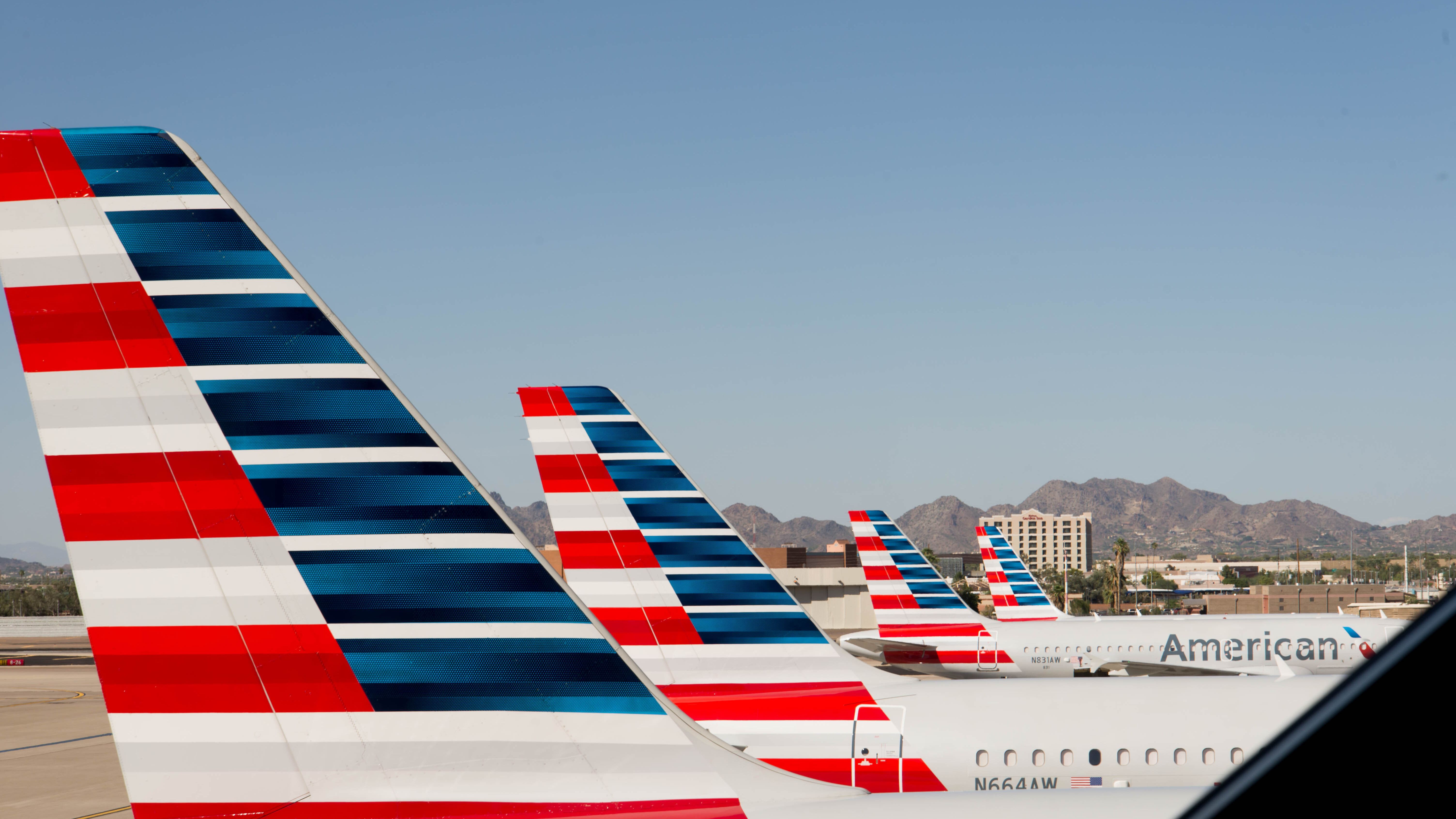 Tails of American Airlines planes