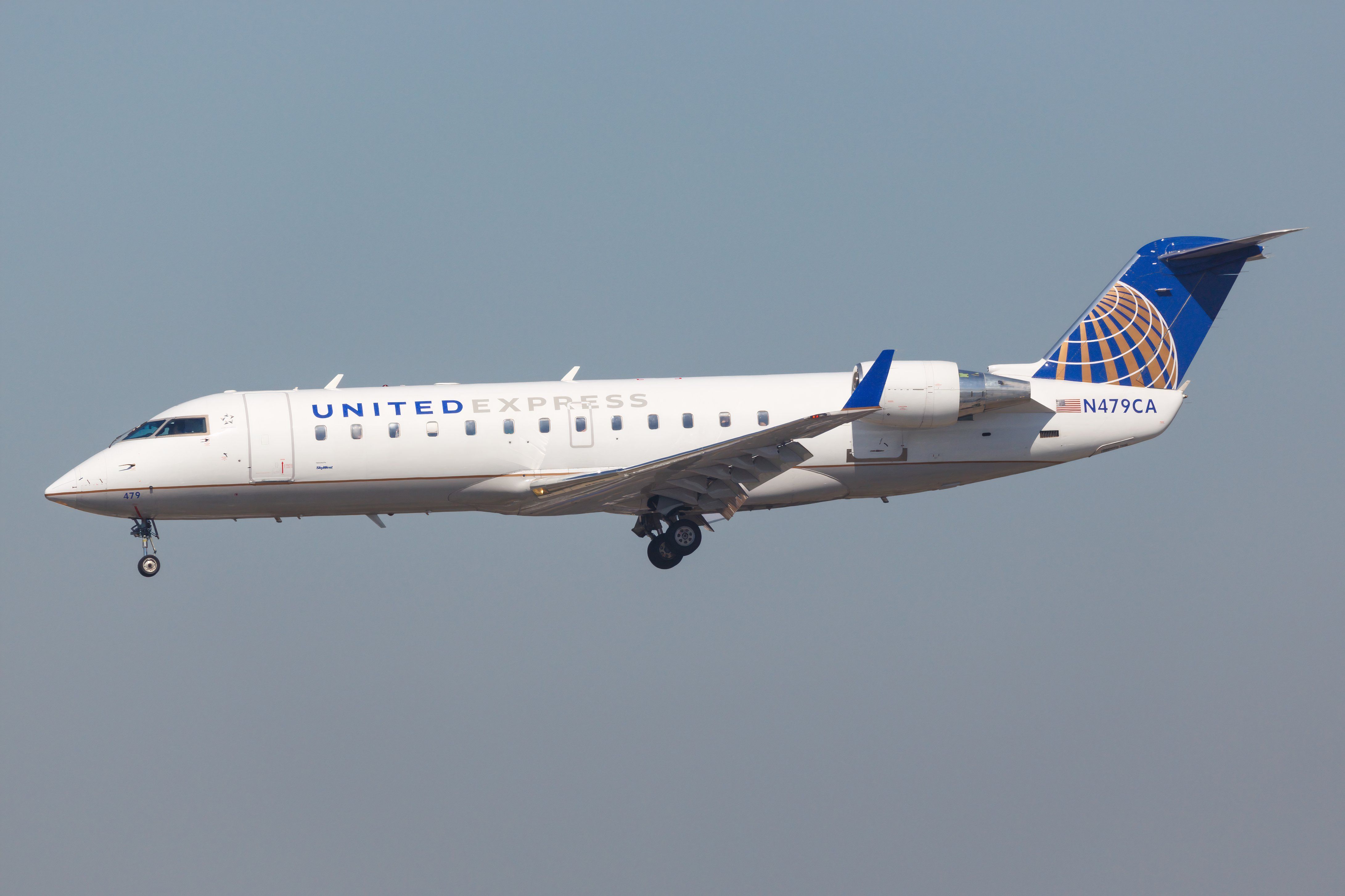 United Express CRJ200 final approach shutterstock_1863673861