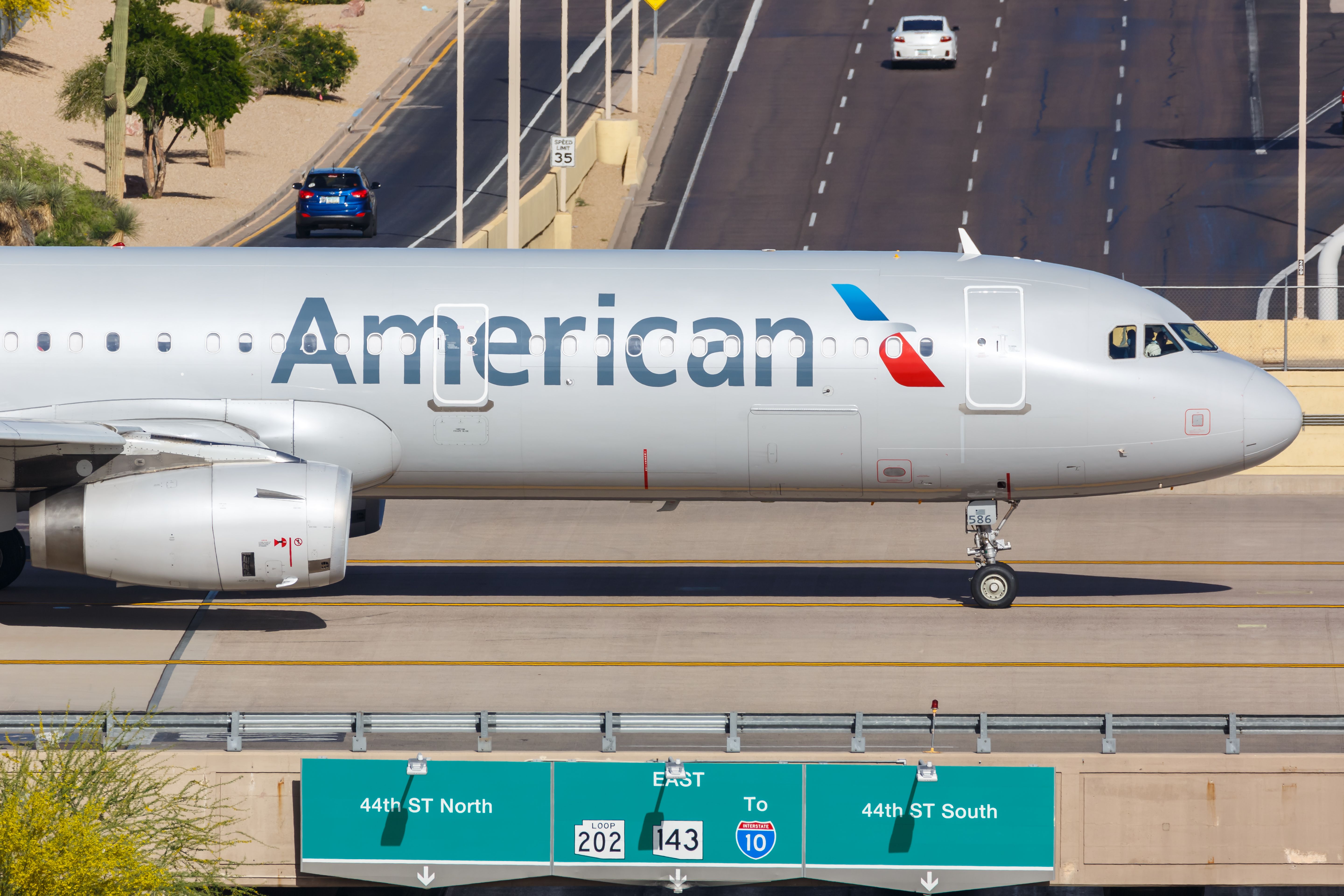 American Airlines Airbus A321 taxiing at PHX shutterstock_1443025571