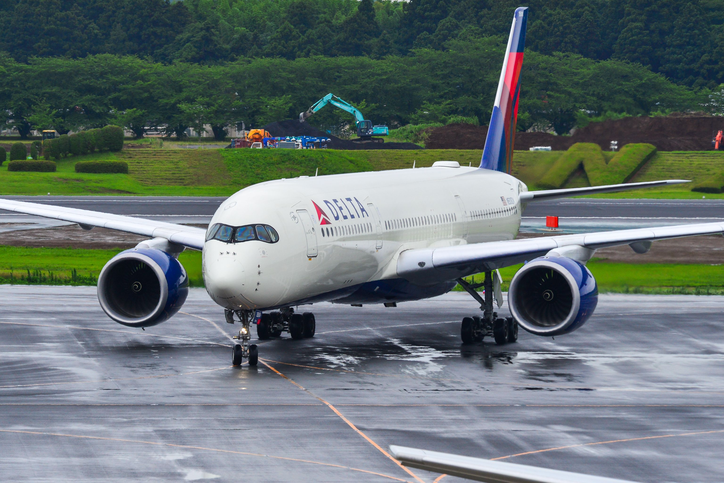 Delta Air Lines Airbus A350-900 taxiing at Tokyo Narita International Airport NRT shutterstock_1451961671