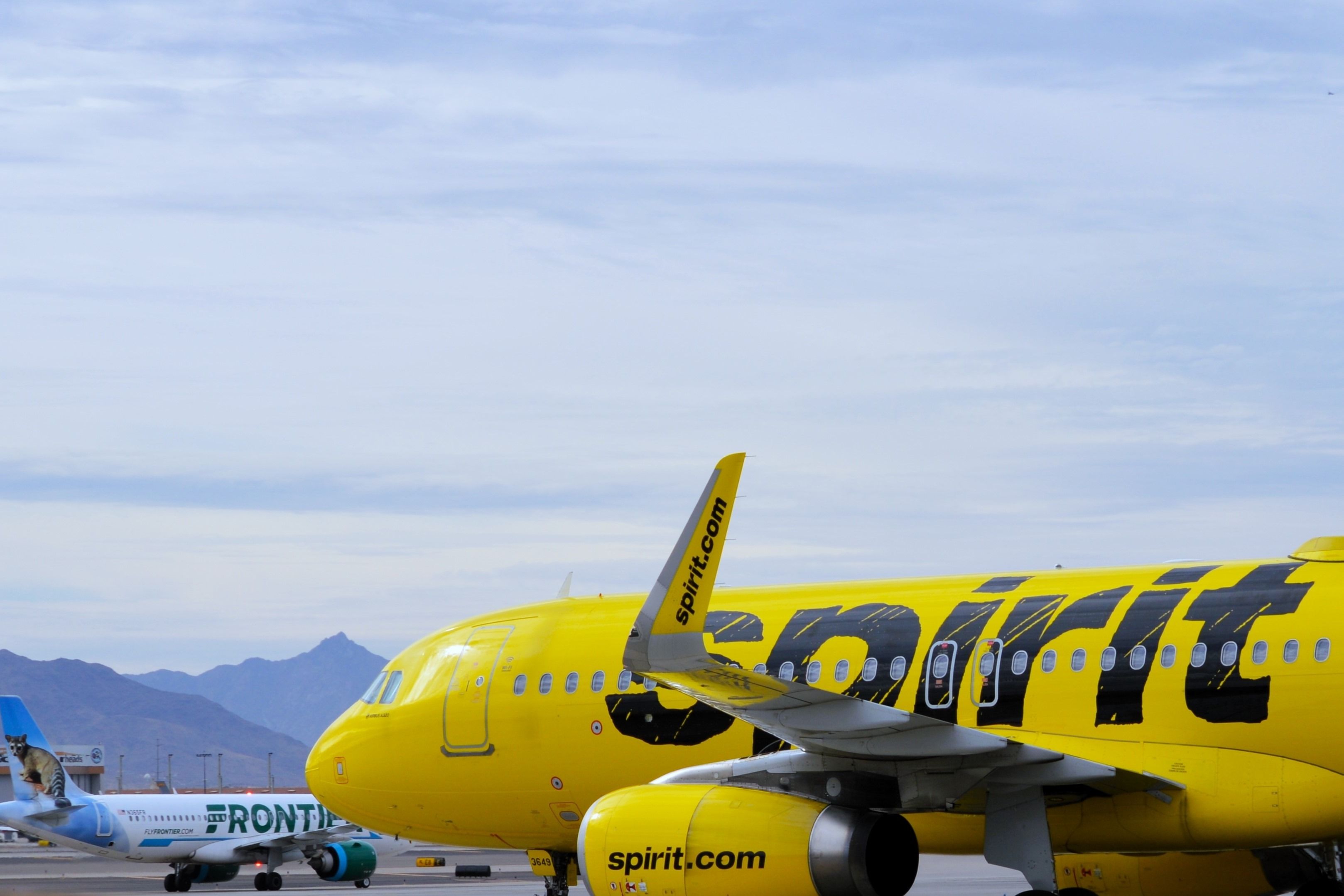 Frontier Airlines and Spirit Airlines aircraft shutterstock_2402735225