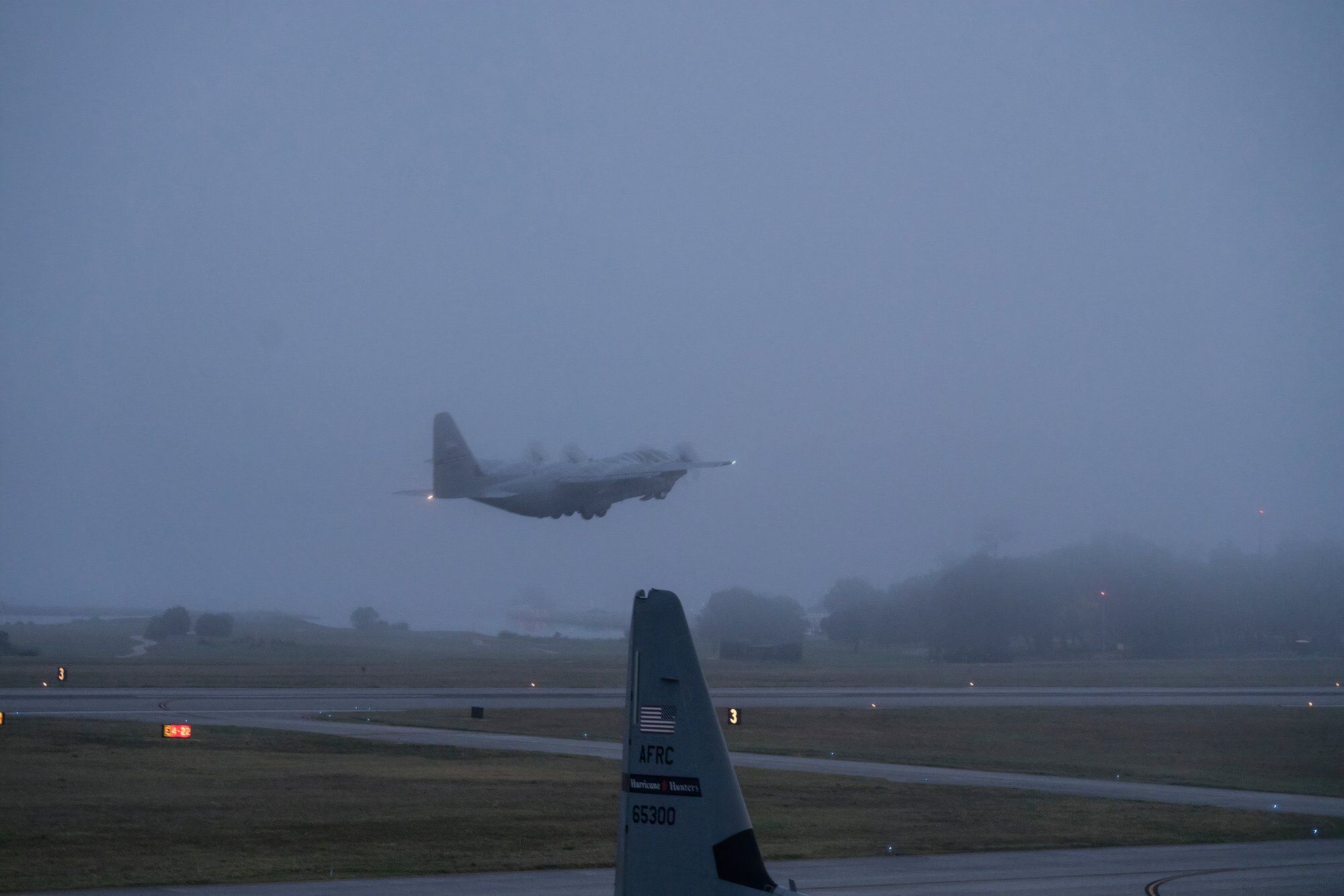 WC-130J taking-off to observe a storm