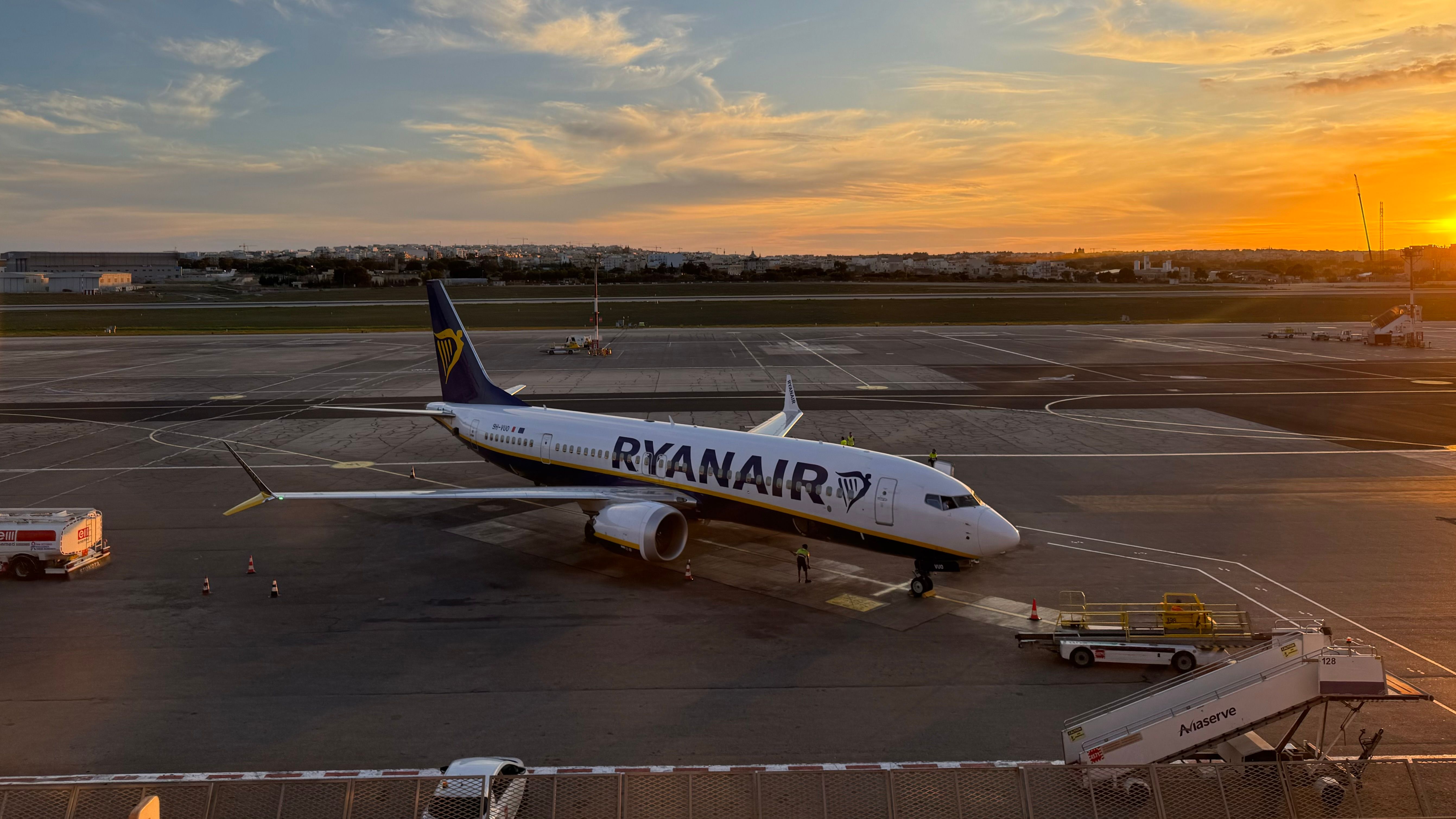 A Ryanair plane at sunset from the La Valette Club Malta Airport terrace