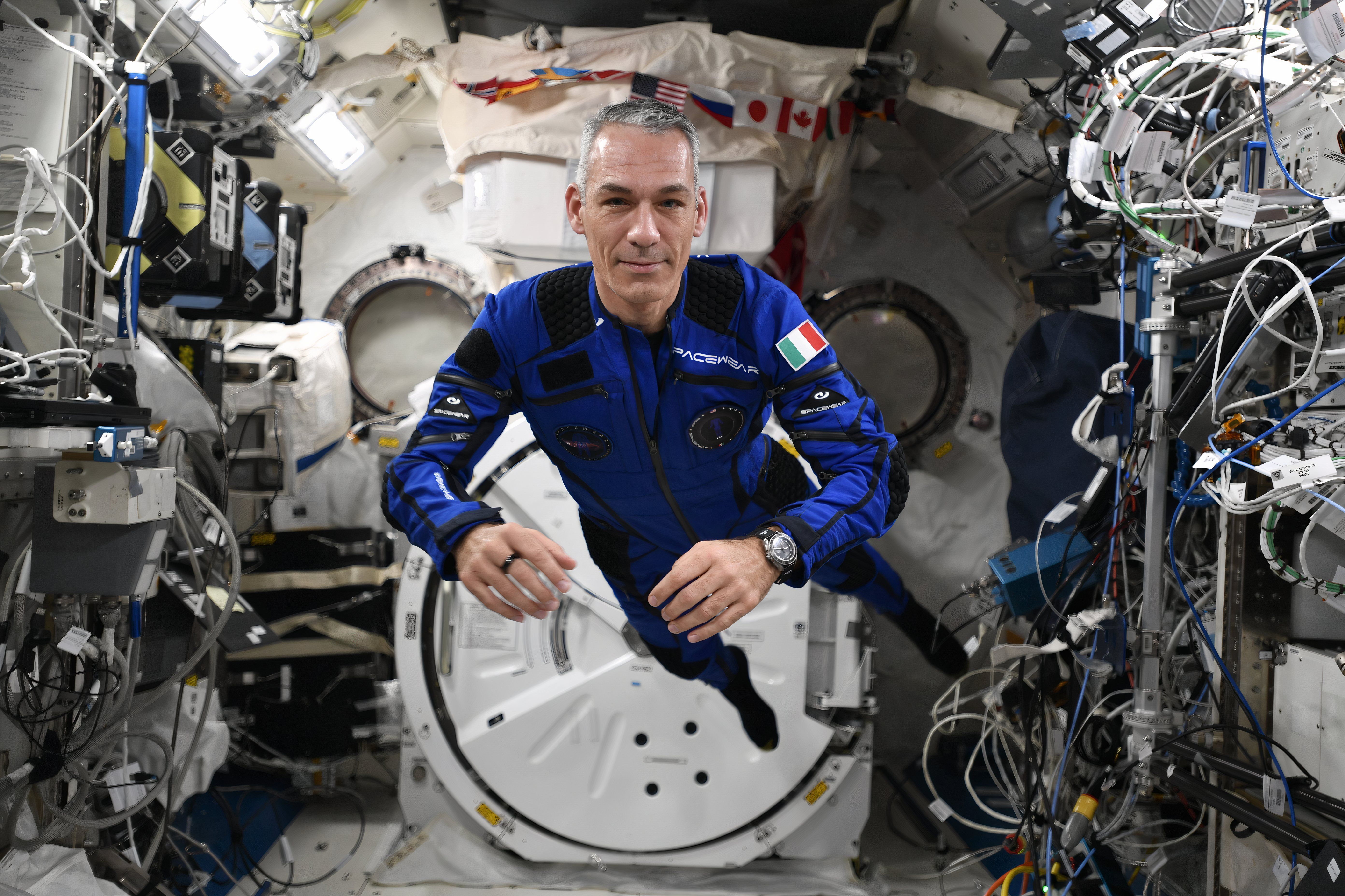 Italian Air Force astronaut Walter Villadei wears-SFS2 on ISS-1