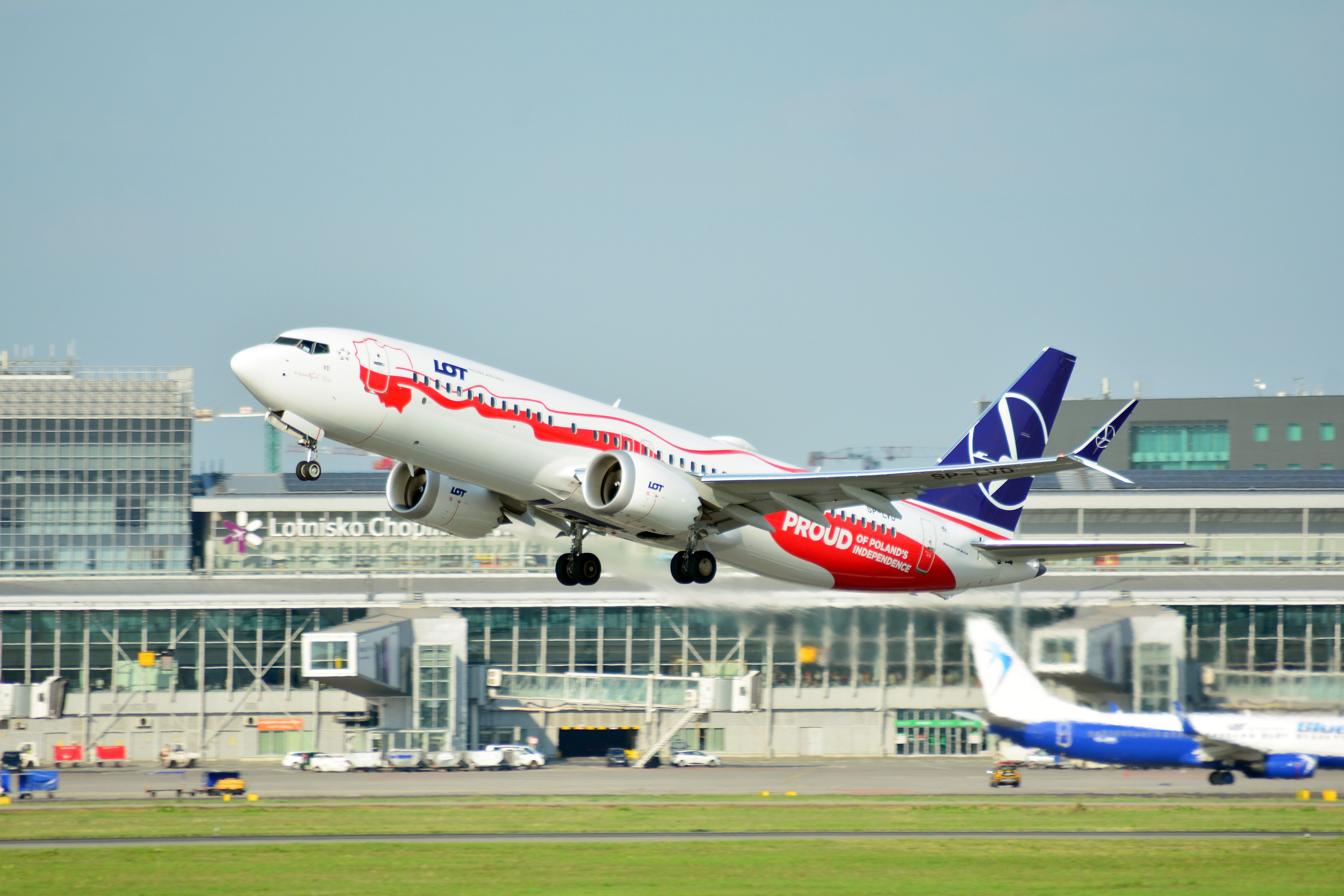 LOT Polish Airlines Boeing 737 MAX 8 departing WAW shutterstock_1139928029