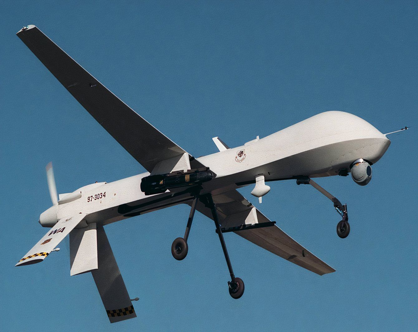 Color photo of a Predator drone flying