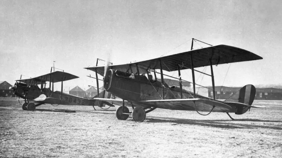 Curtiss Jennies are parked on an airfield at the Langley Memorial Aeronautical Laboratory NACA