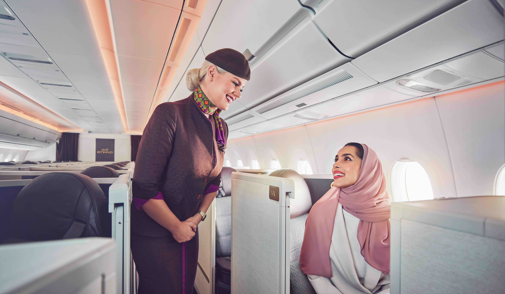 Etihad cabin crew and guest