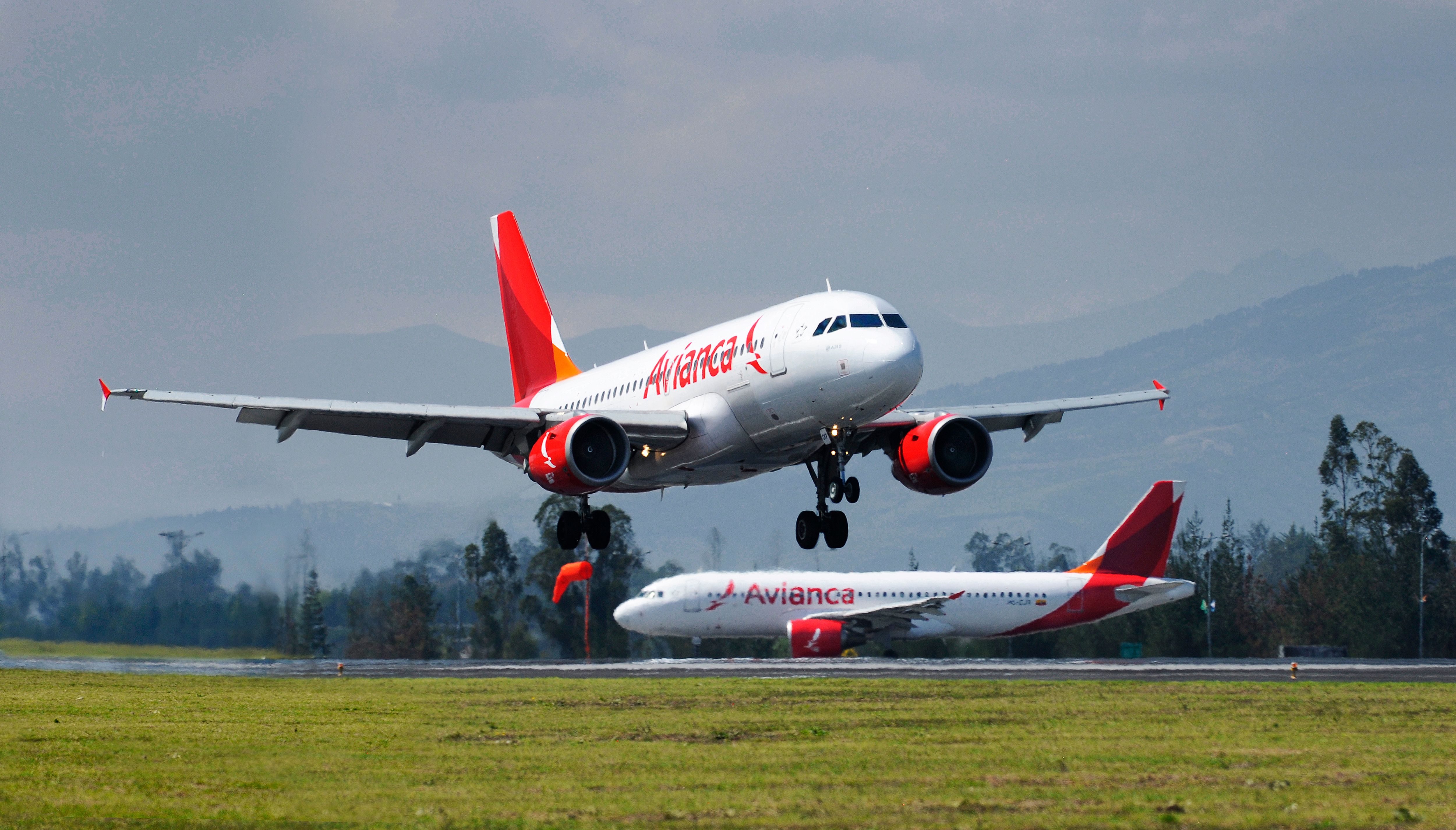 Two avianca Airbus A319 planes at Quito International Airport.