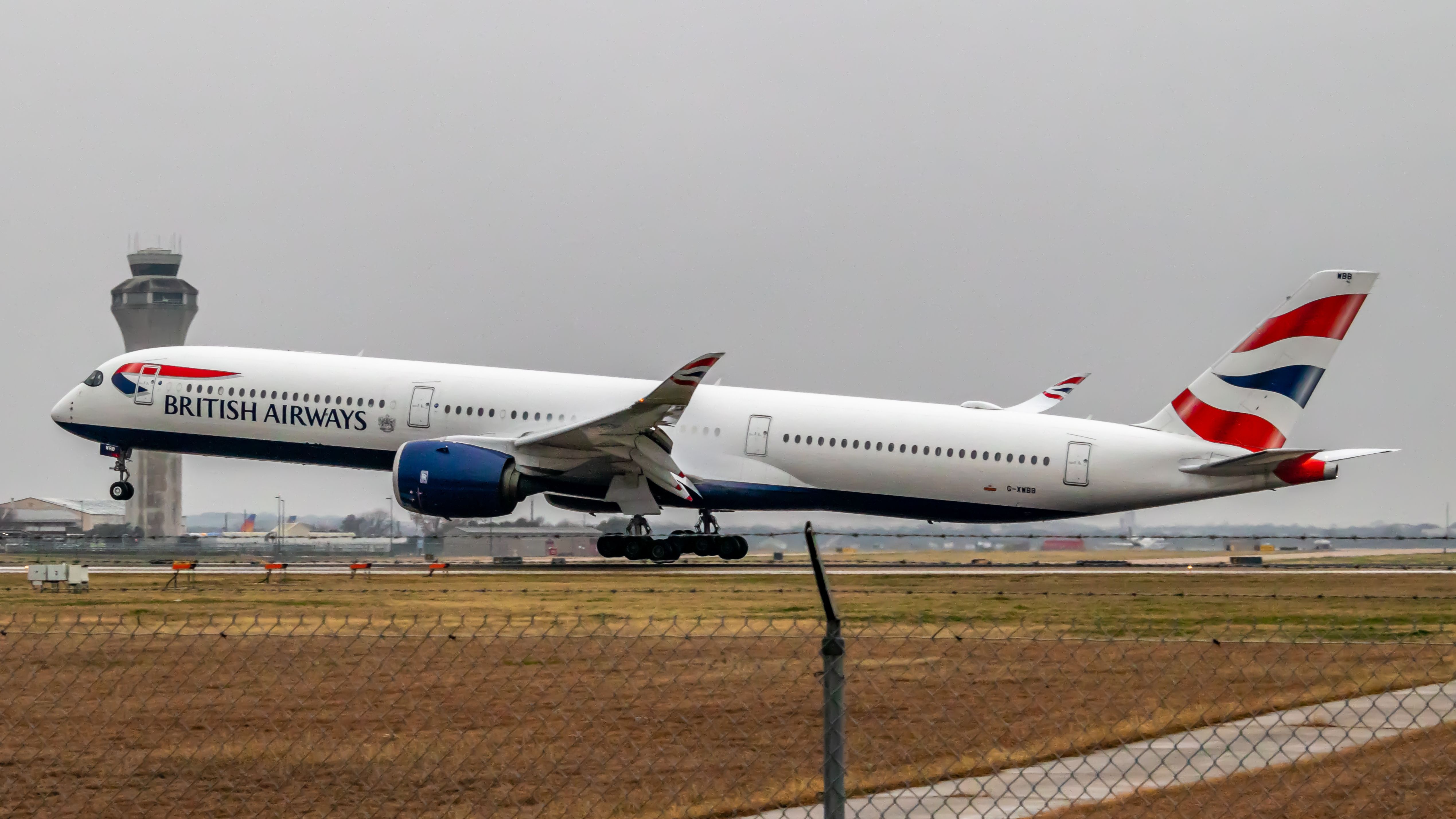 British Airways Airbus A350-1000 (G-XWBB) landing at Austin-Bergstrom International Airport.