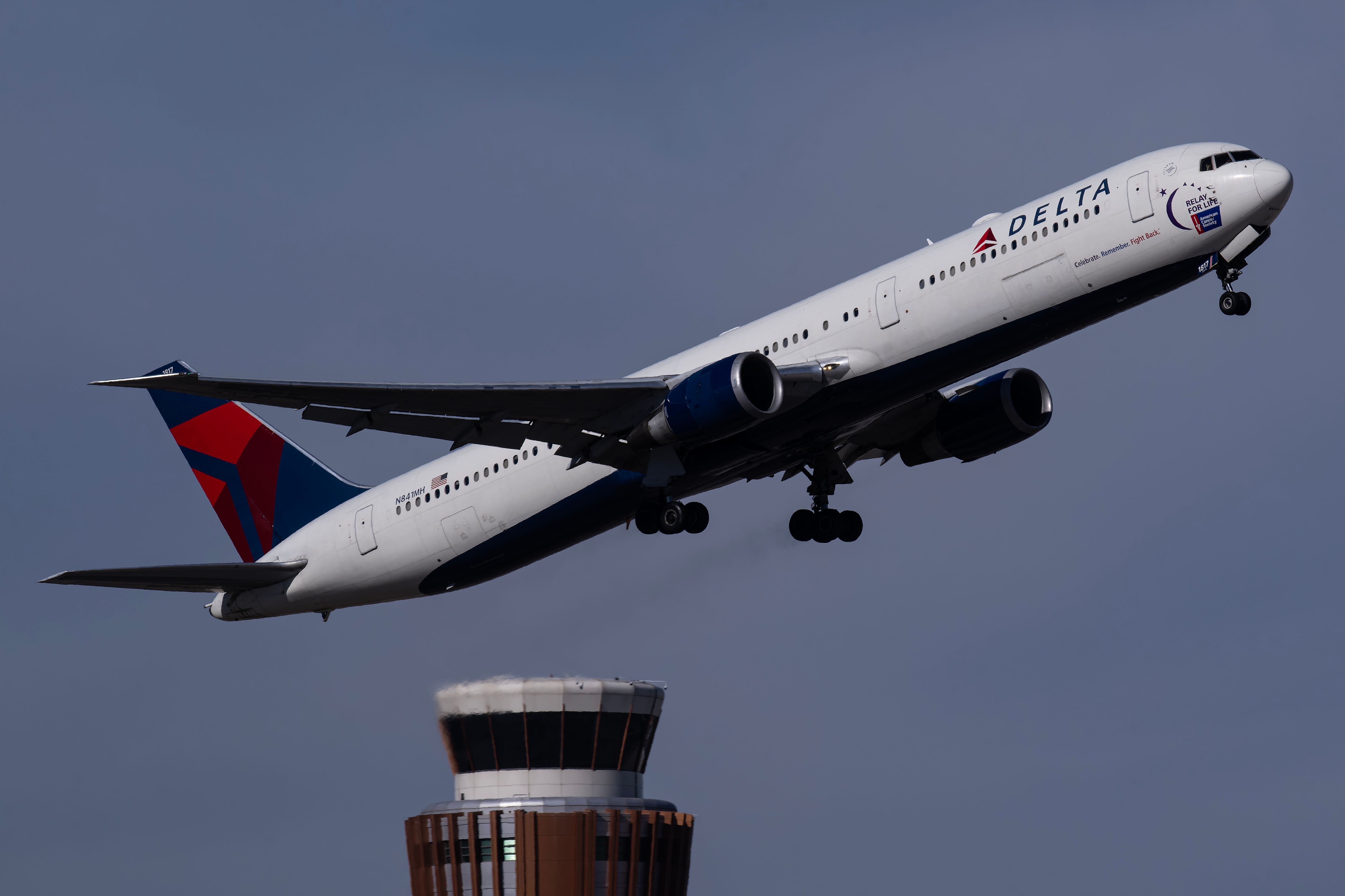 Delta Air Lines Boeing 767-400ER (N841MH) "Relay for Life" taking off from Phoenix Sky Harbor International Airport.