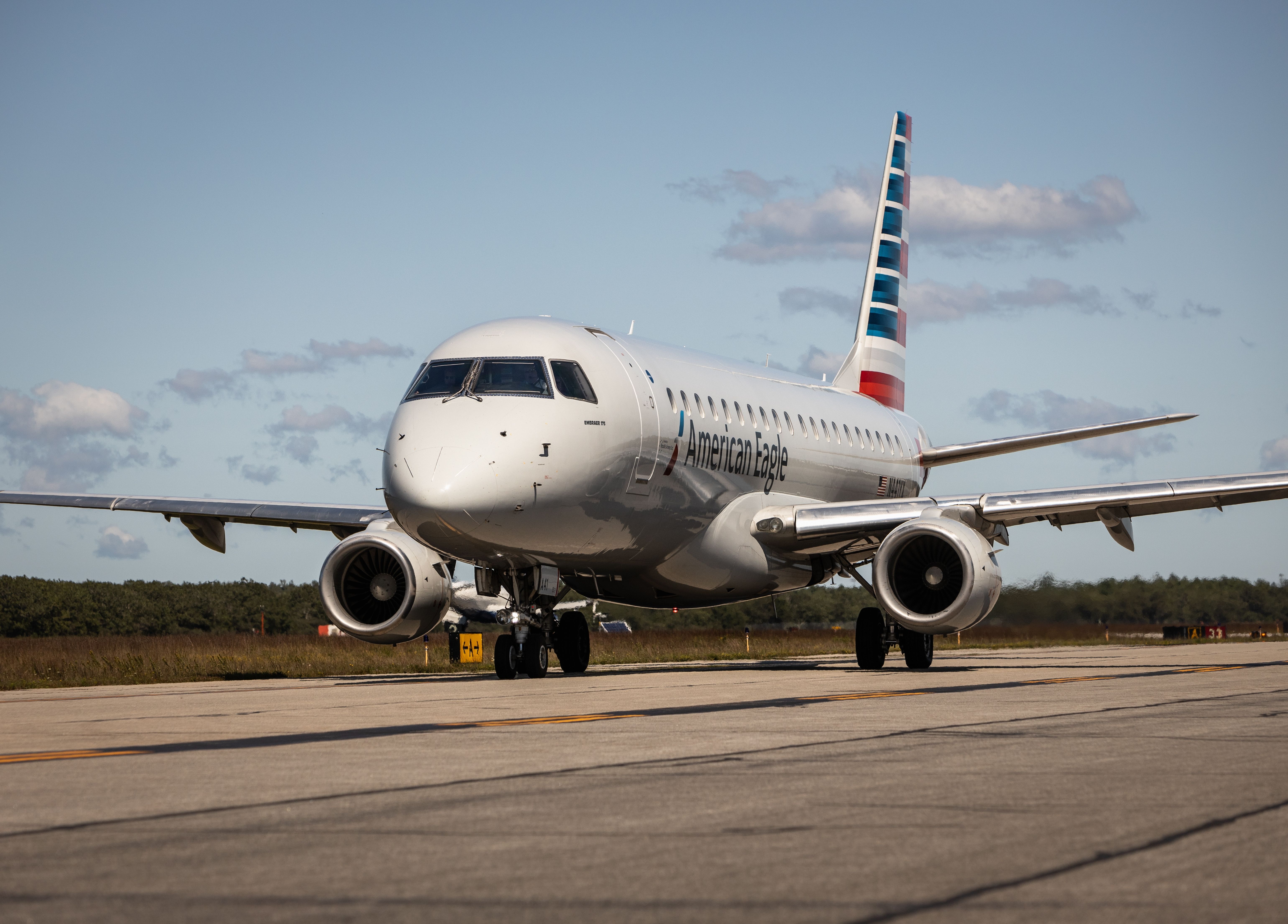 EDGARTOWN, US - Sep 02, 2023: An American Airlines Embraer jet plane taxiing at Marthas Vineyard Airport before departing.