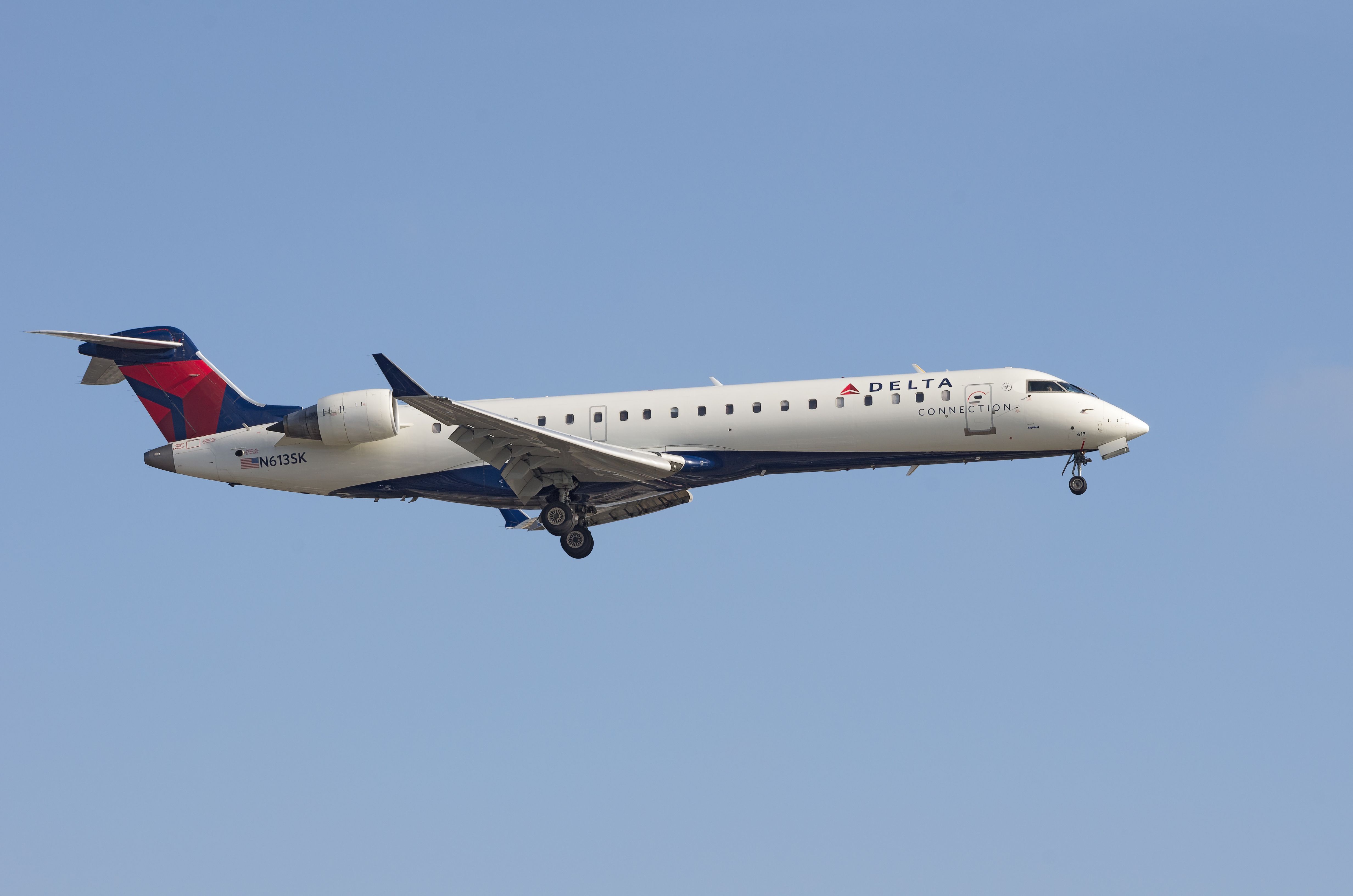 Delta Connection (SkyWest Airlines) Bombardier CRJ700 (N613SK) on approach at Los Angeles International Airport.