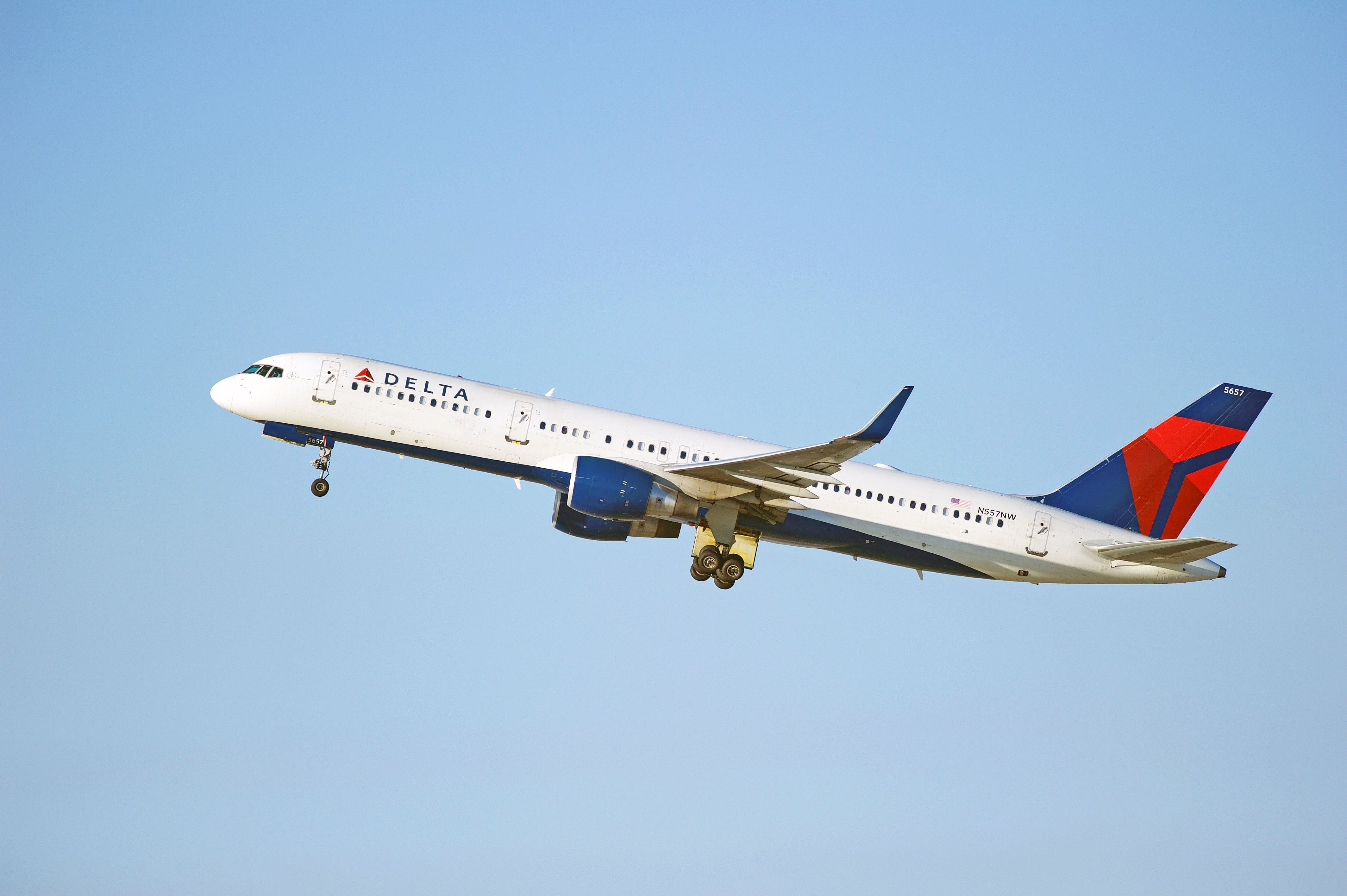 Delta Air Lines Boeing 757-251(WL) aircraft is airborne as it departs Los Angeles International Airport