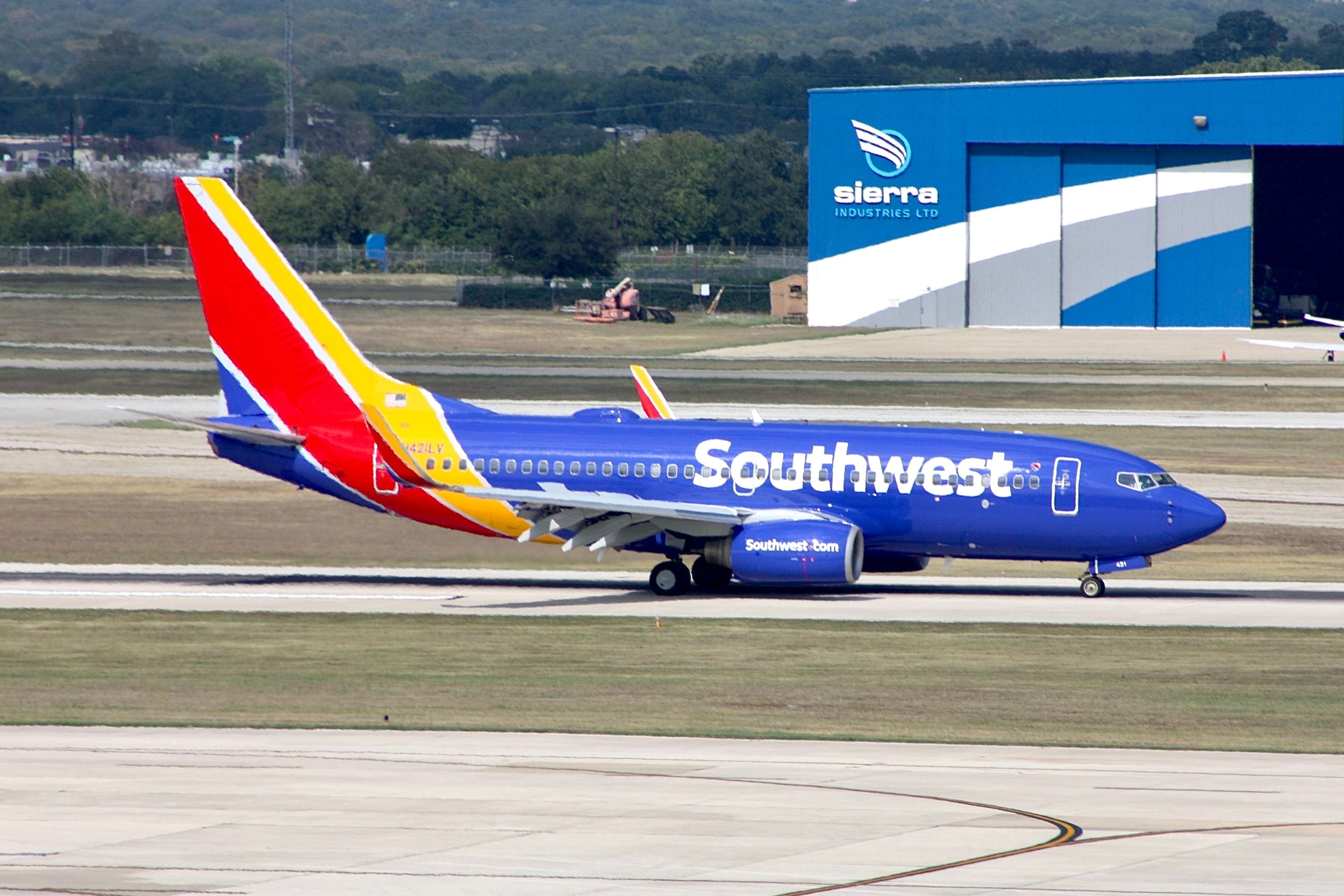 Southwest Airlines Boeing 737-700 taxiing at SAT shutterstock_2276353555