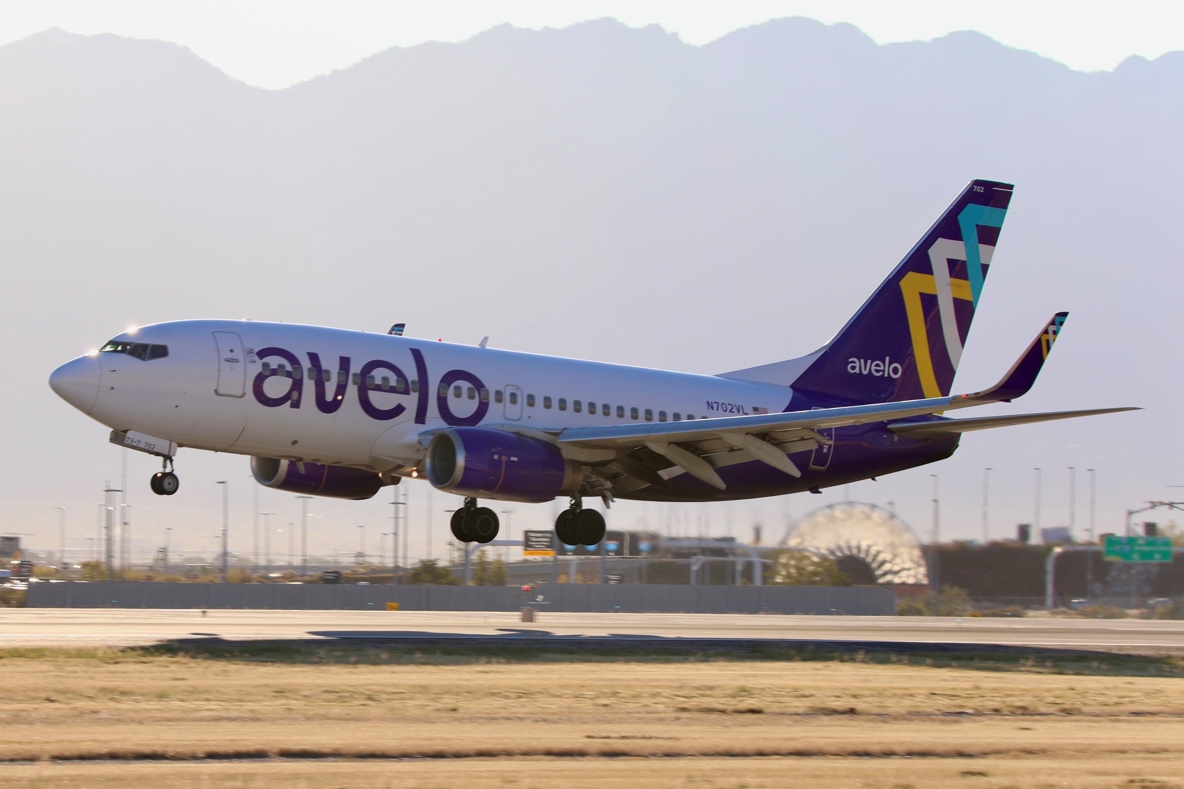 An Avelo Airlines Boeing 737-700 registered N702VL lands at Salt Lake City Airport SLC