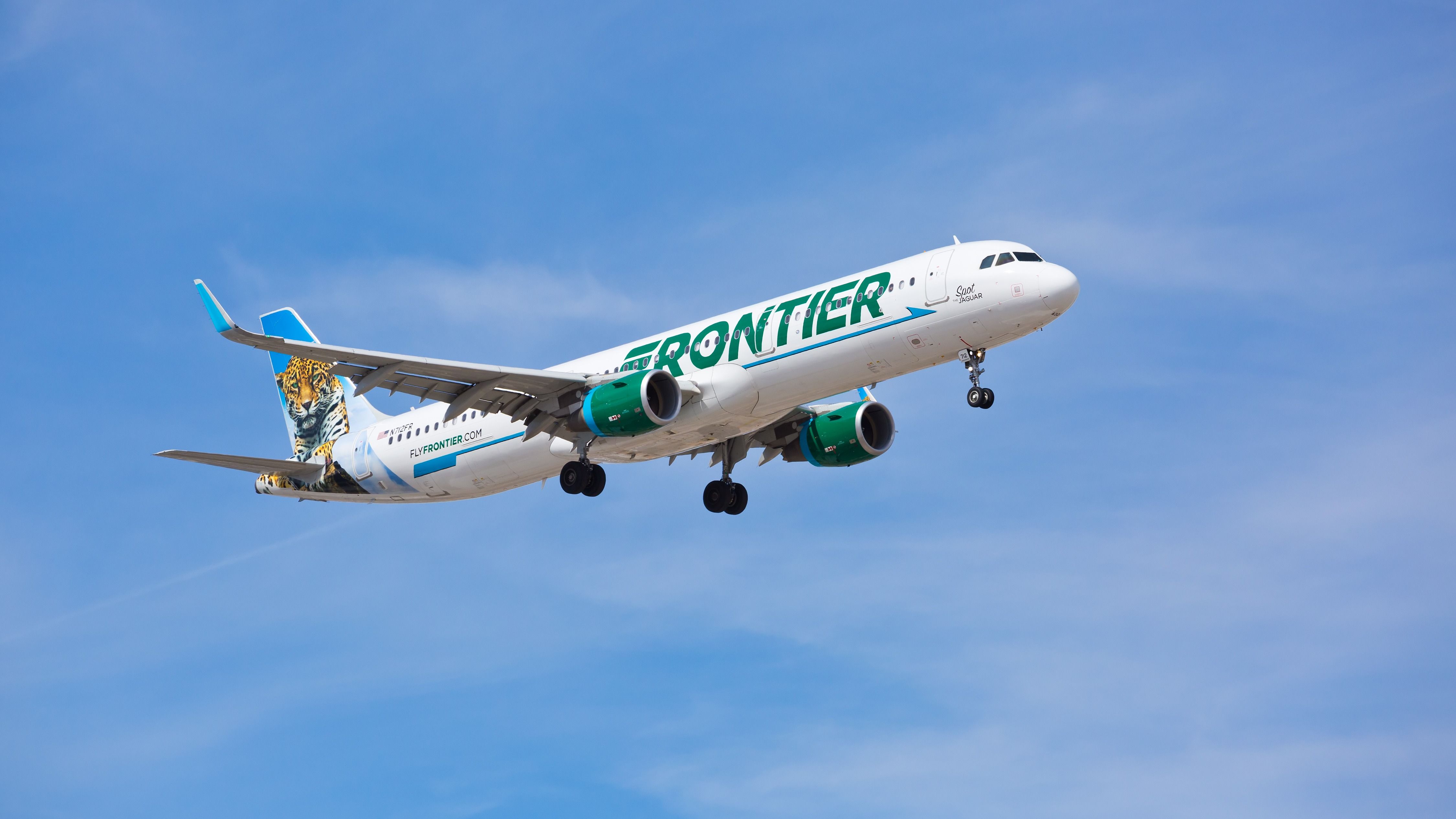 Frontier Airlines Airbus A320 landing at ORD shutterstock_1055952923